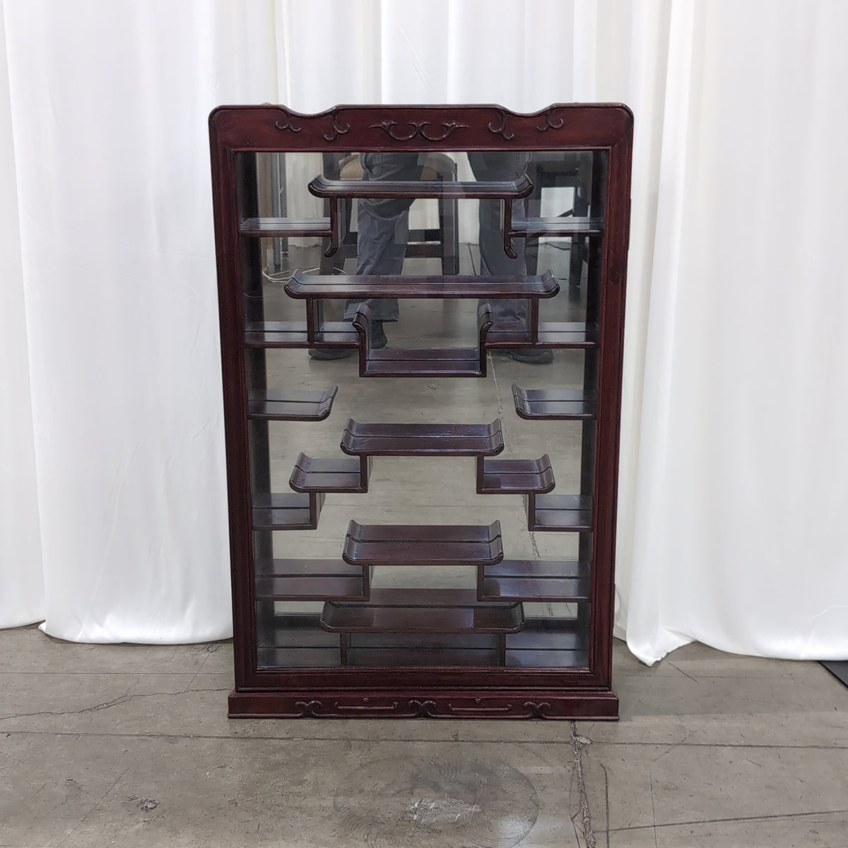 Reddish Brown Wood Display Case with Intricate Shelving