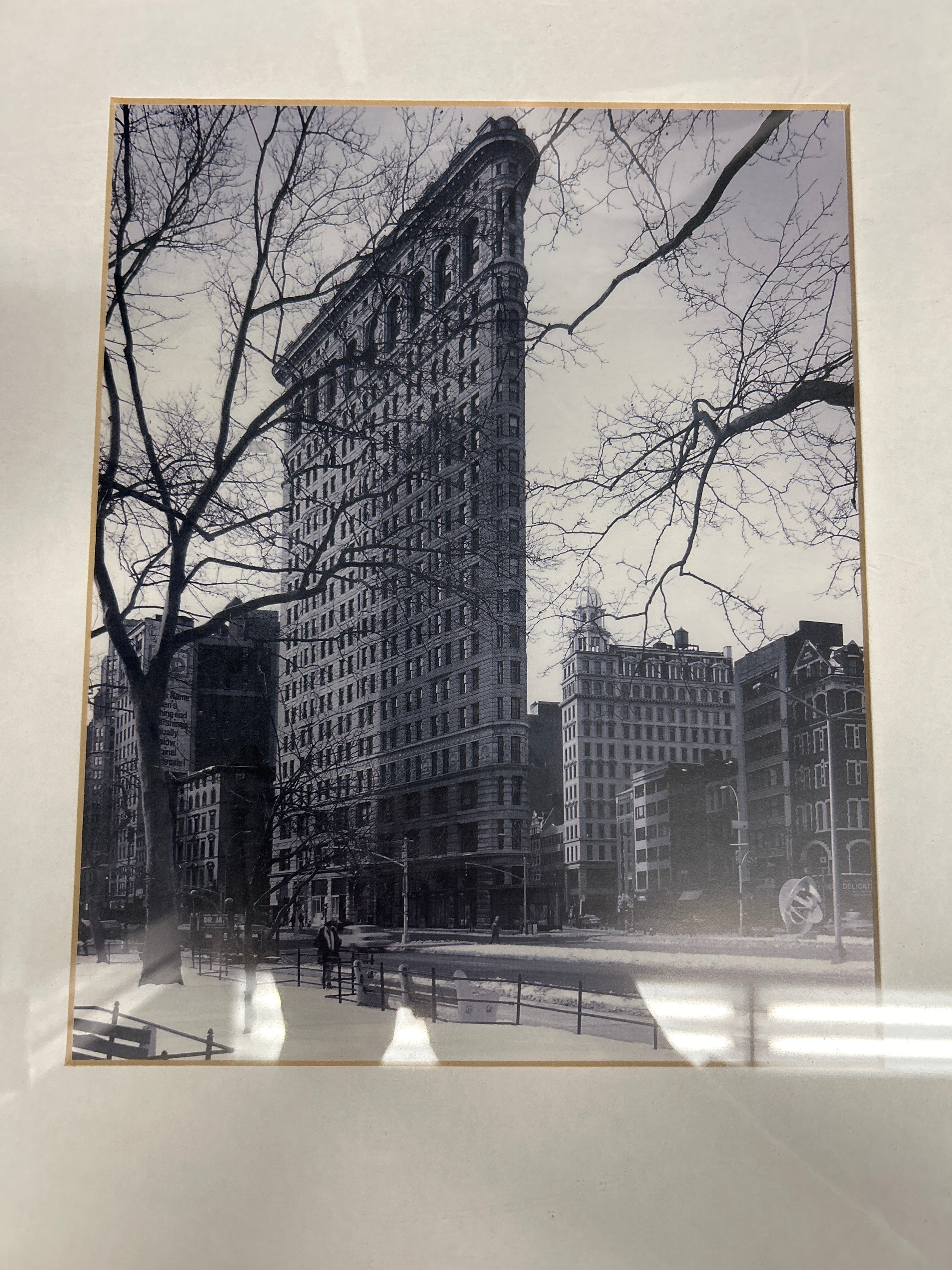 Black And White City Photo With Broken Corner on Frame