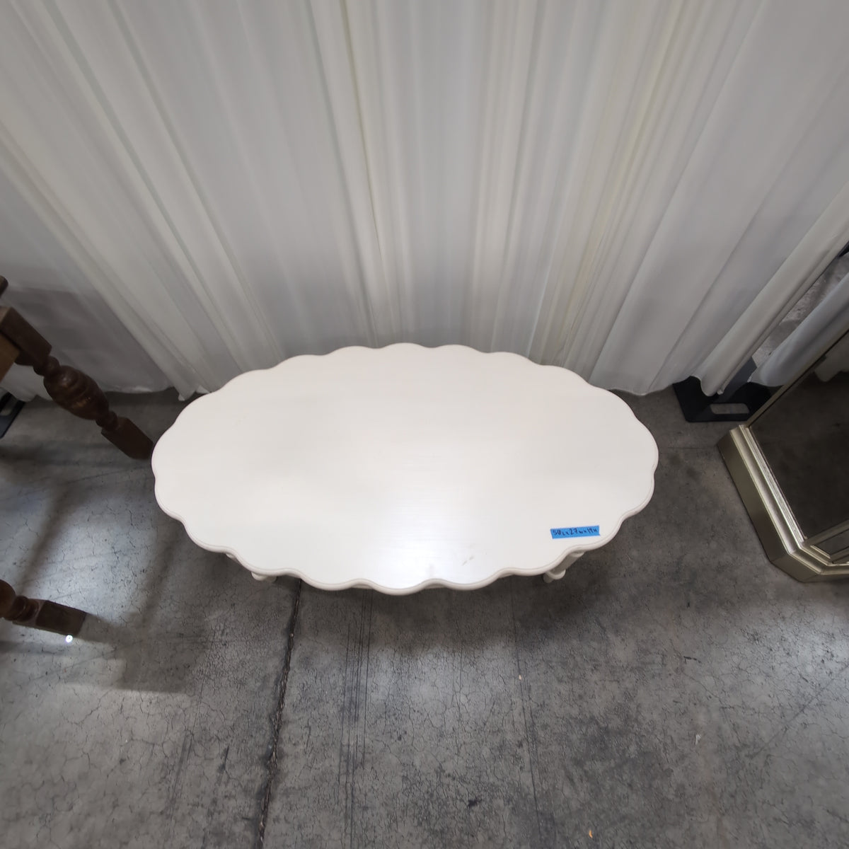 White Scalloped Oval Coffee Table