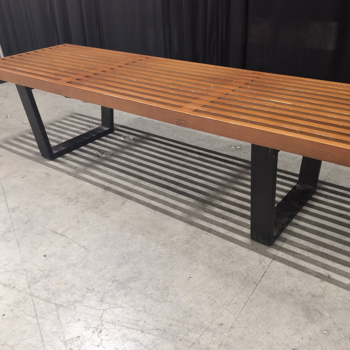 Brown Slatted Outdoor Bench in Hardwood