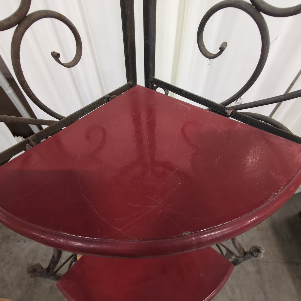 Ornate Scrolled Metal Corner Shelf with Red Shelves