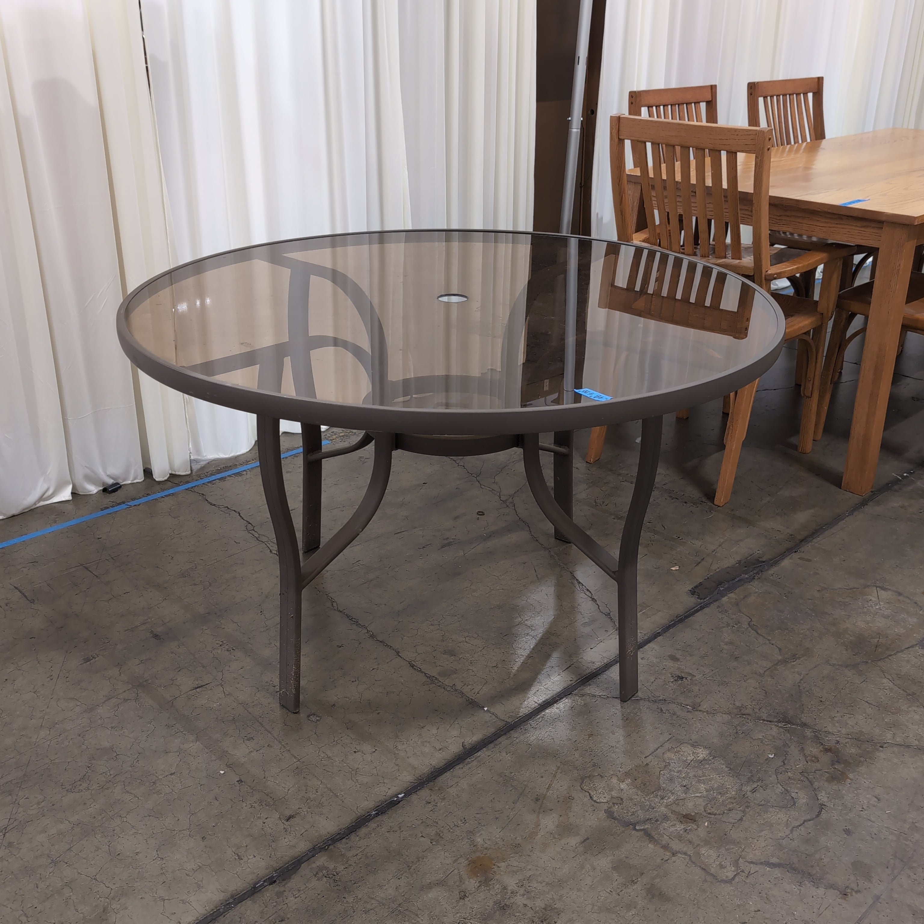 Round Smoked Glass Patio Dining Table in Metal