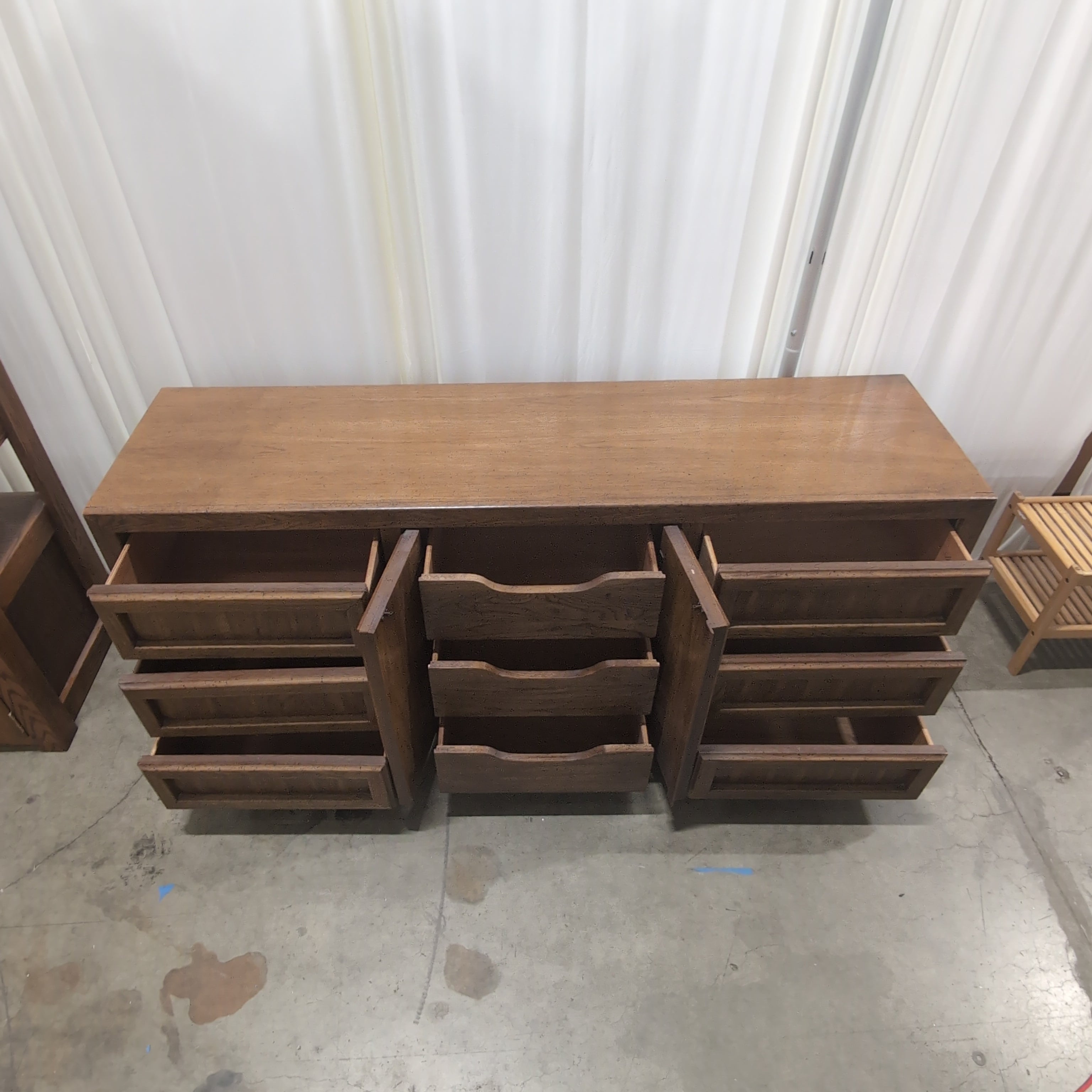 Long Brown Wood Dresser with Geometric Paneling