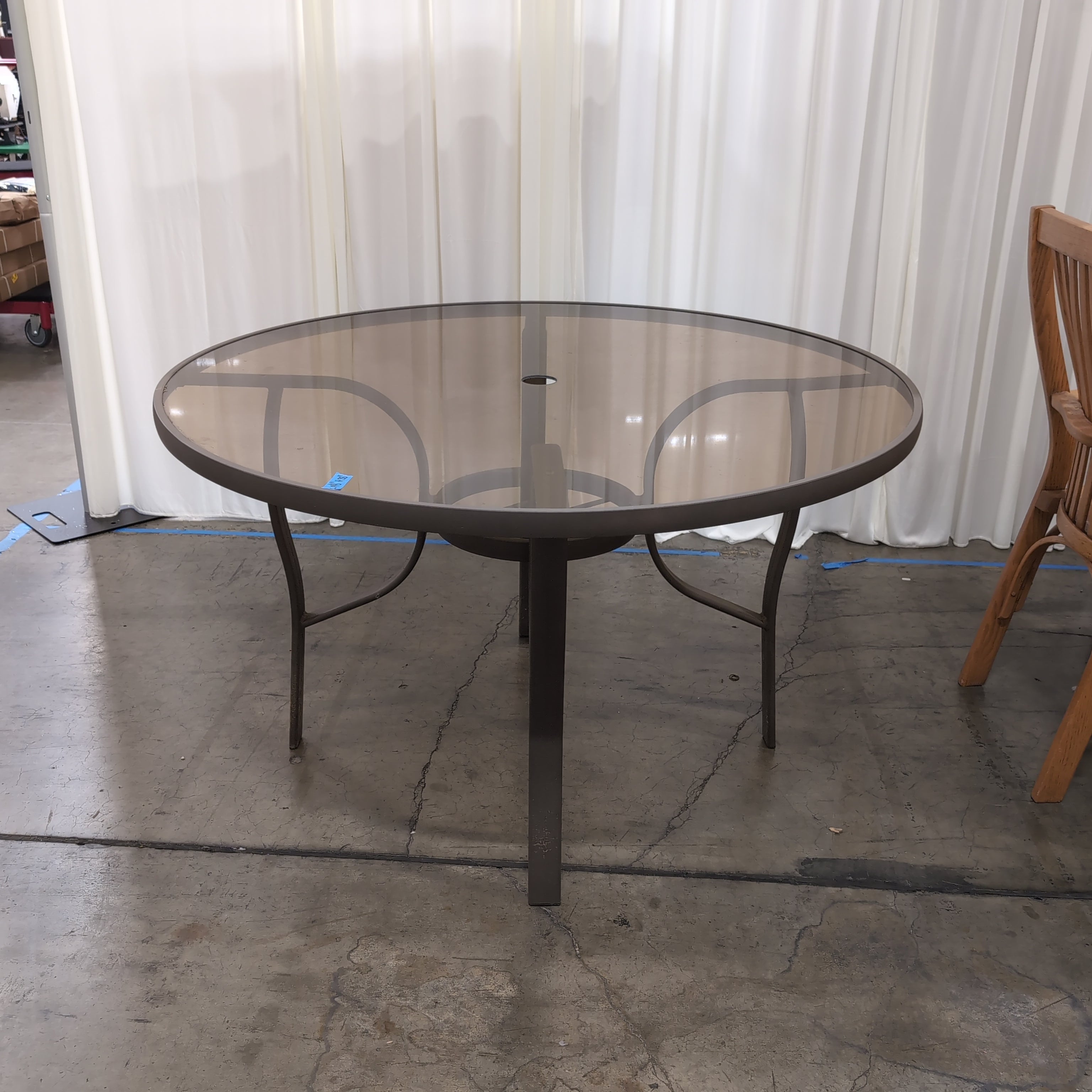 Round Smoked Glass Patio Dining Table in Metal