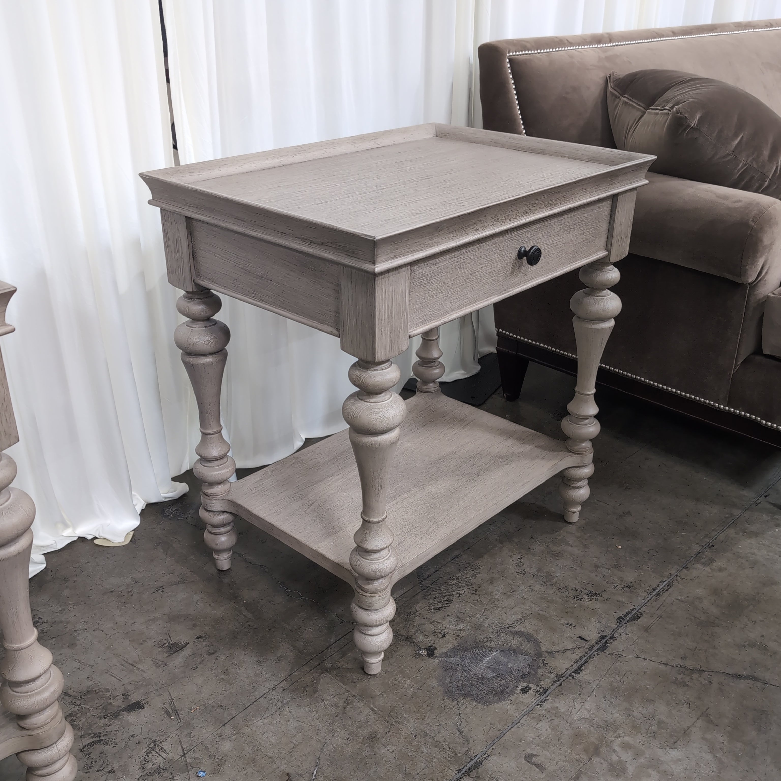 Light Greige Wood Nightstand with Turned Legs