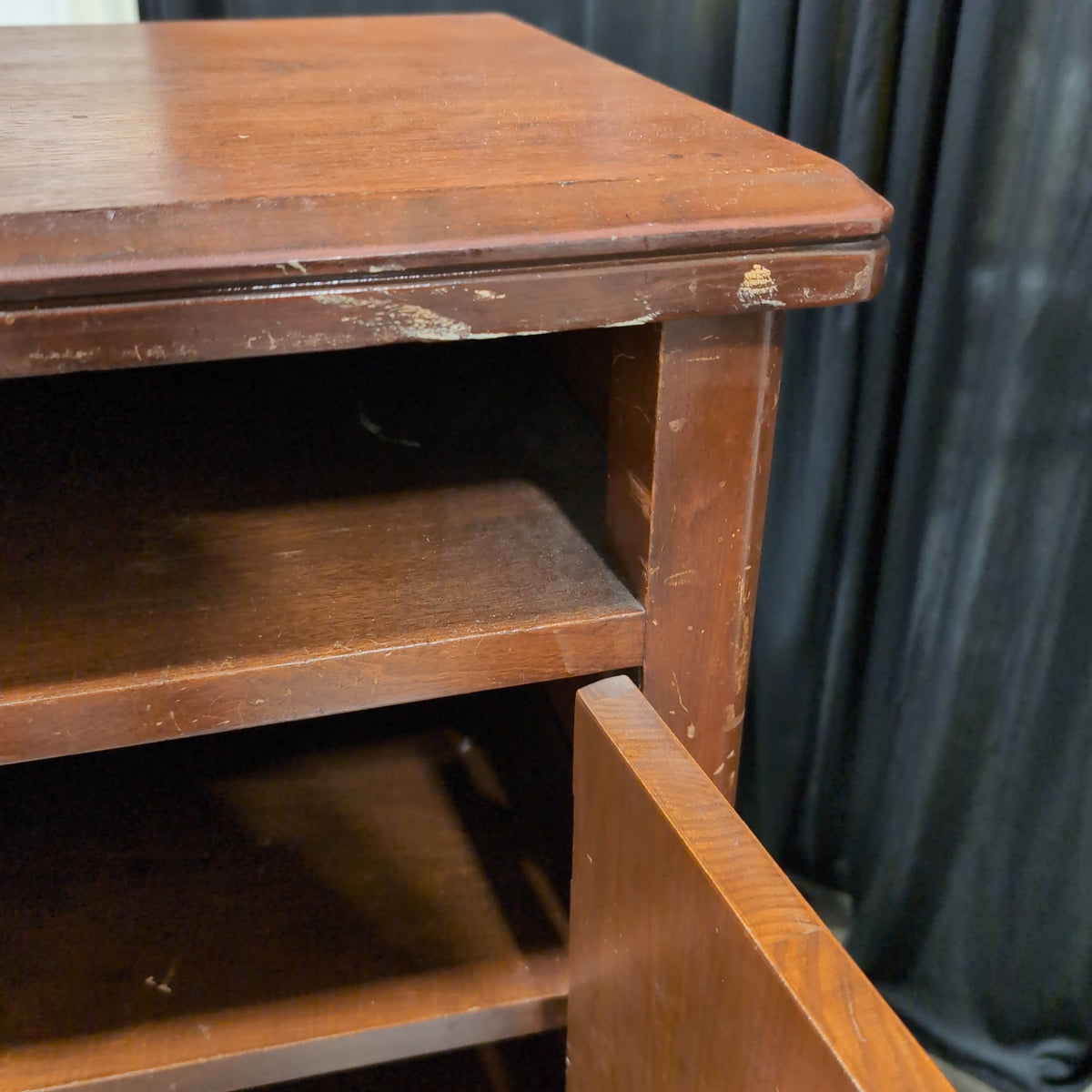 Traditional Reddish-Brown Wood Nightstand with Cabinet Door
