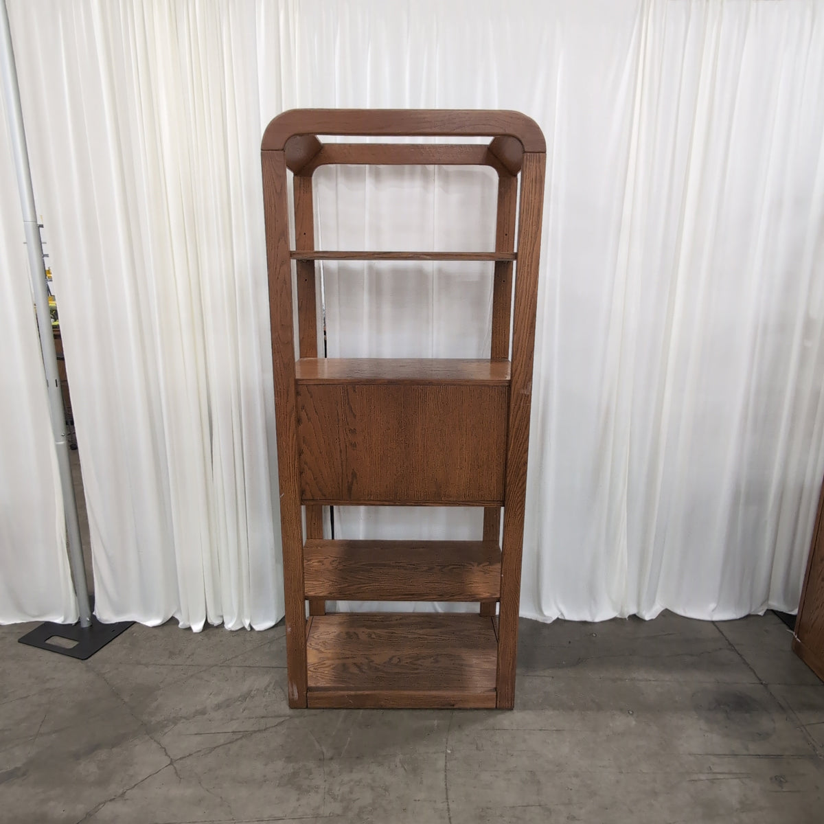 Medium Brown Wood Bookcase with Geometric Cabinet Door