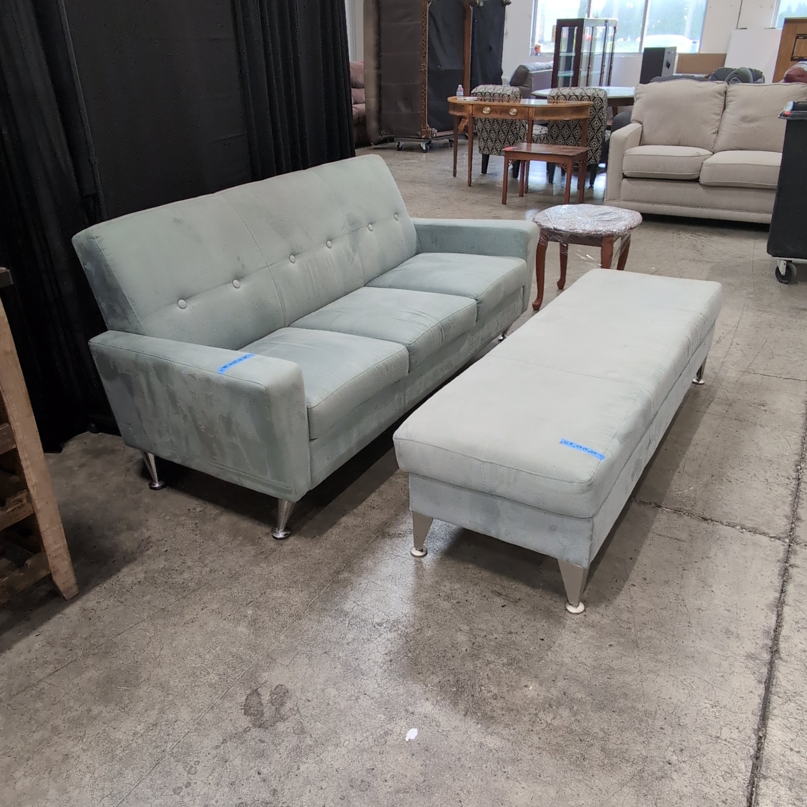 Light Grey Upholstered Couch with Tufted Back