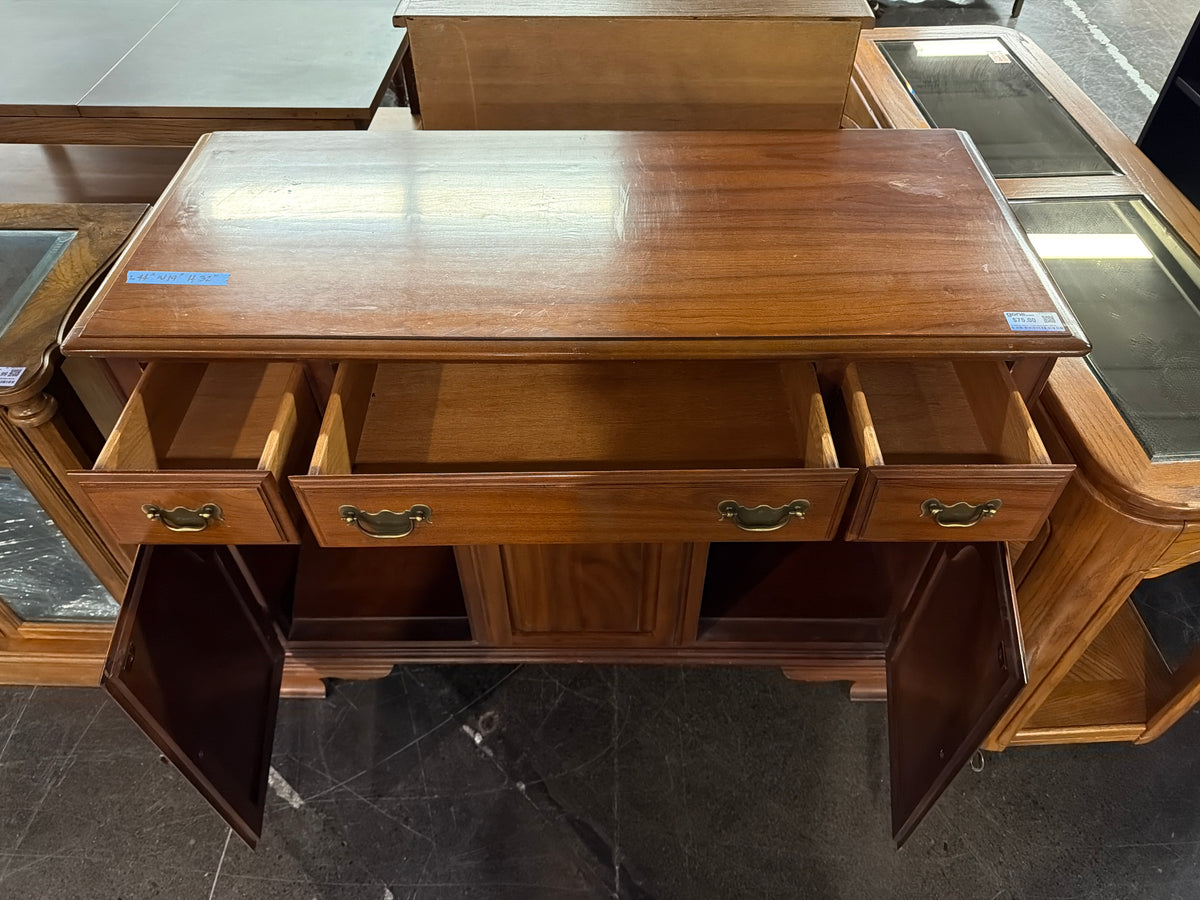 Traditional Cherry-Toned Wood Buffet with Ornate Hardware
