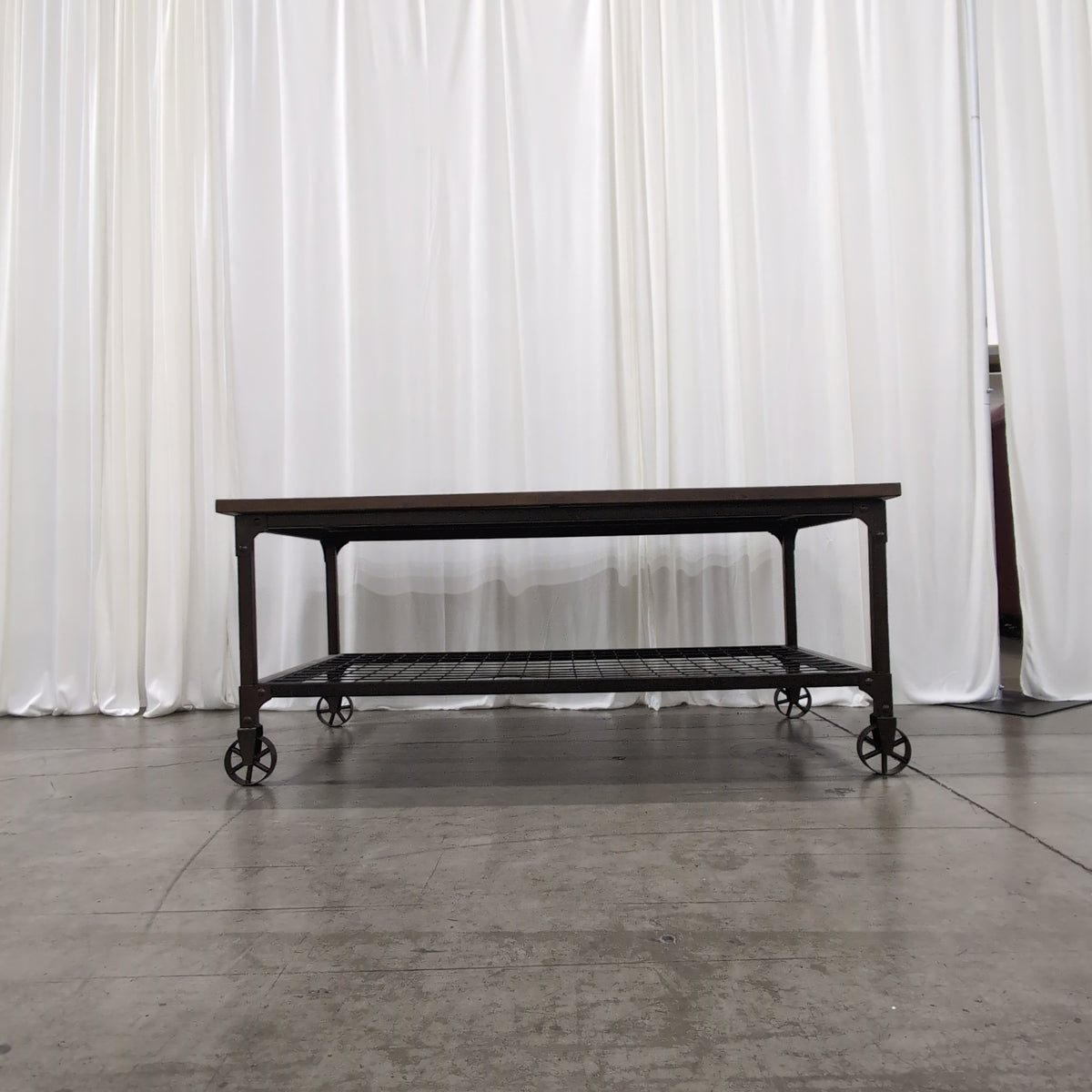 Industrial Wood and Metal Coffee Table with Wheels