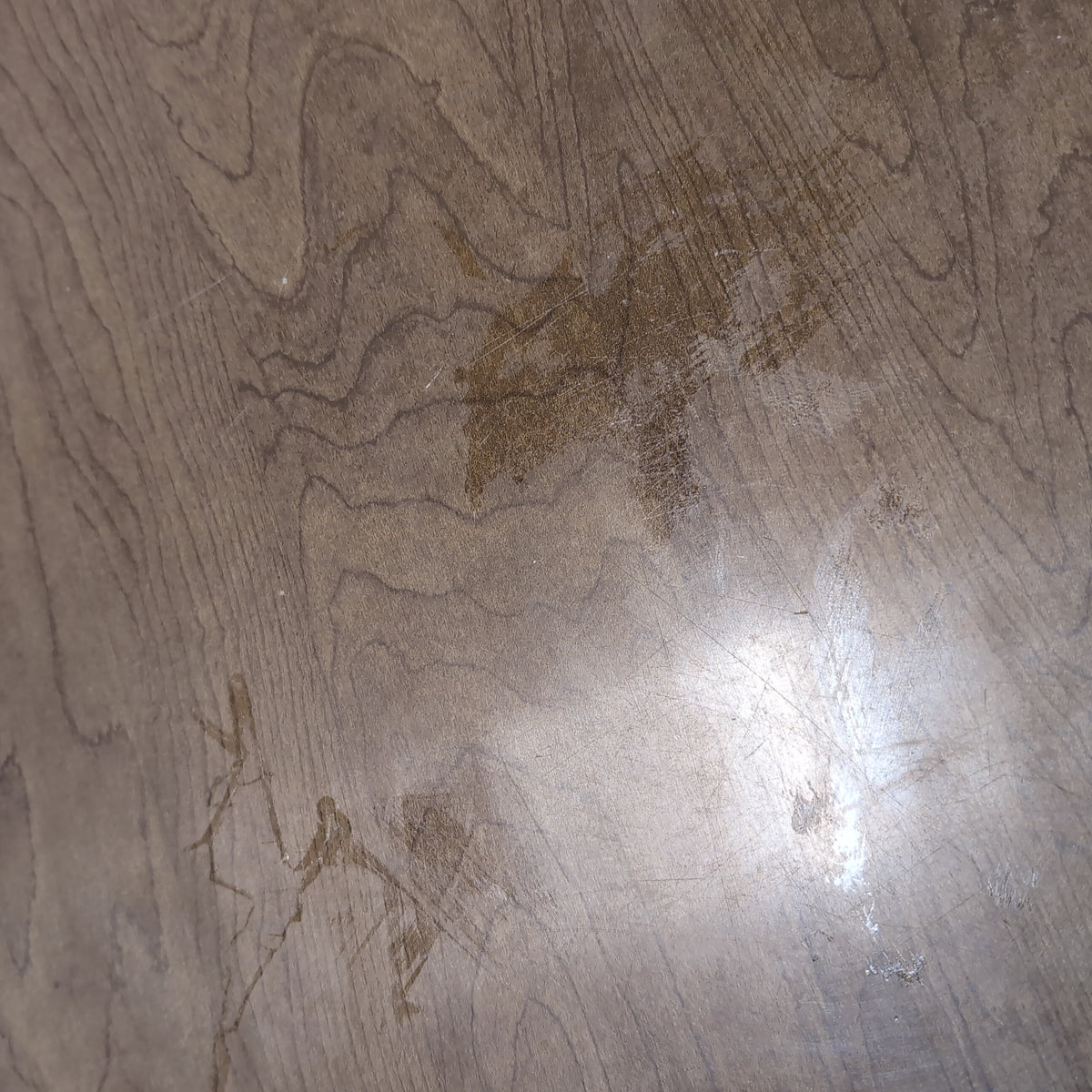 Round Medium Brown Wood Dining Table with Leaf Seam