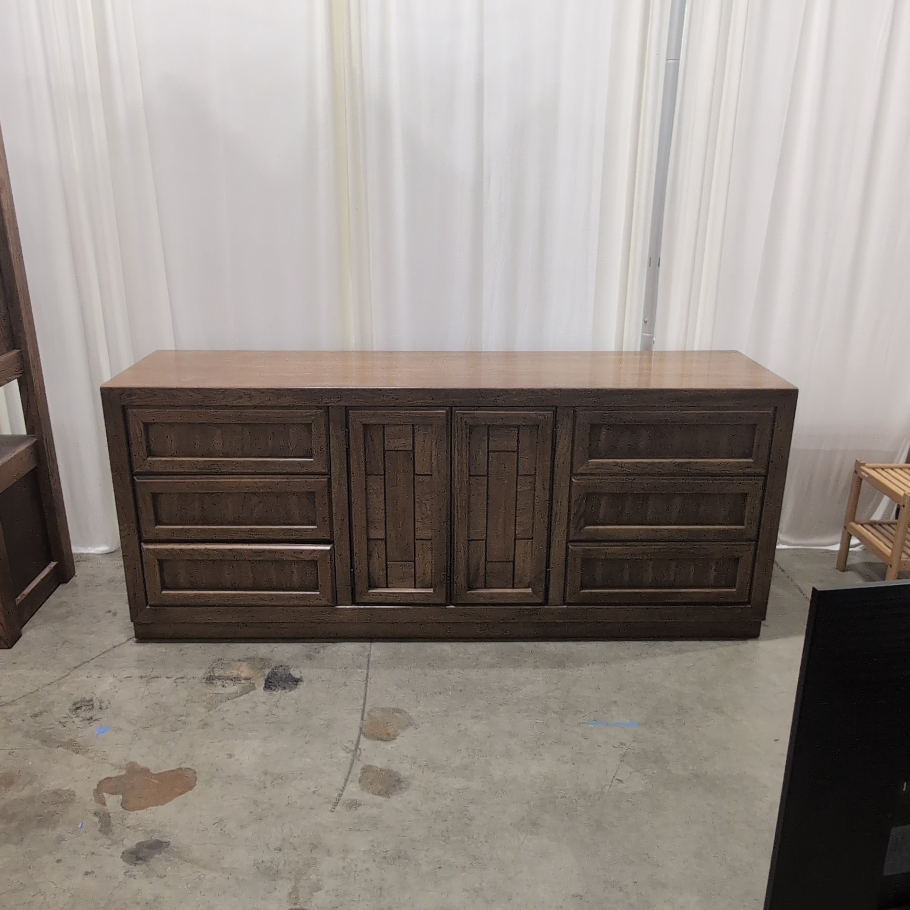 Long Brown Wood Dresser with Geometric Paneling