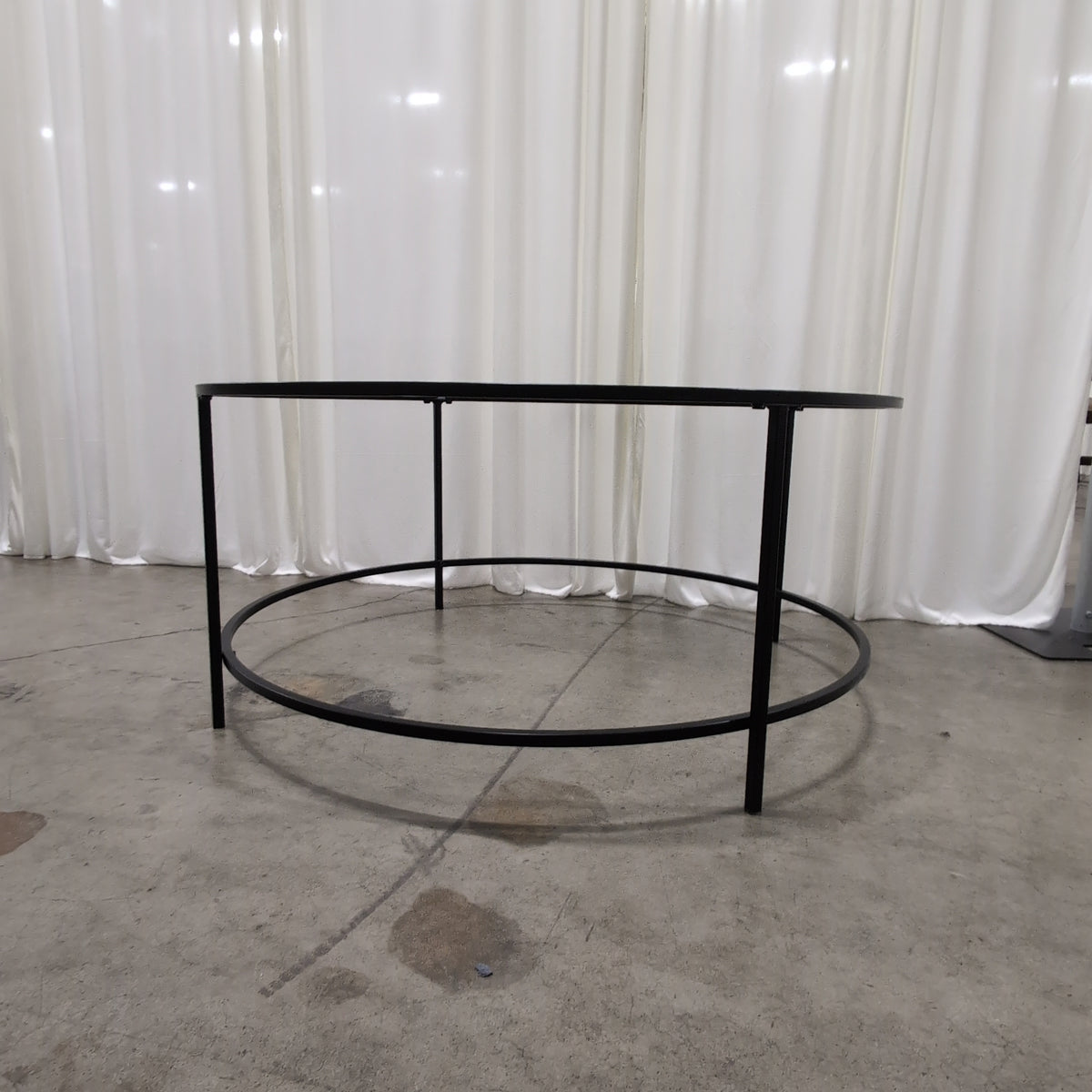 Round Glass Coffee Table with Black Metal Frame