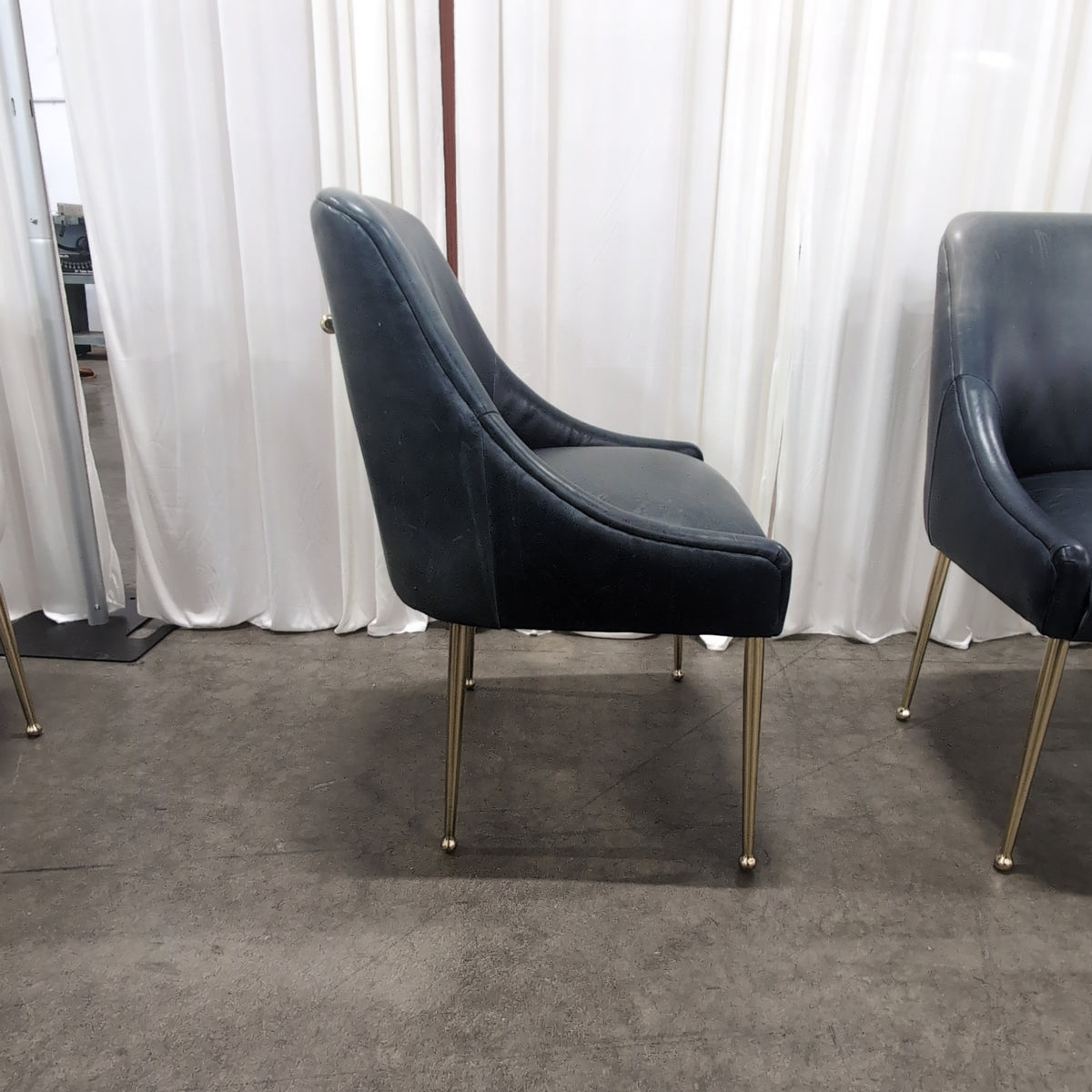 Set of Four Antropologie Dark Blue Upholstered Dining Chair with Gold Legs