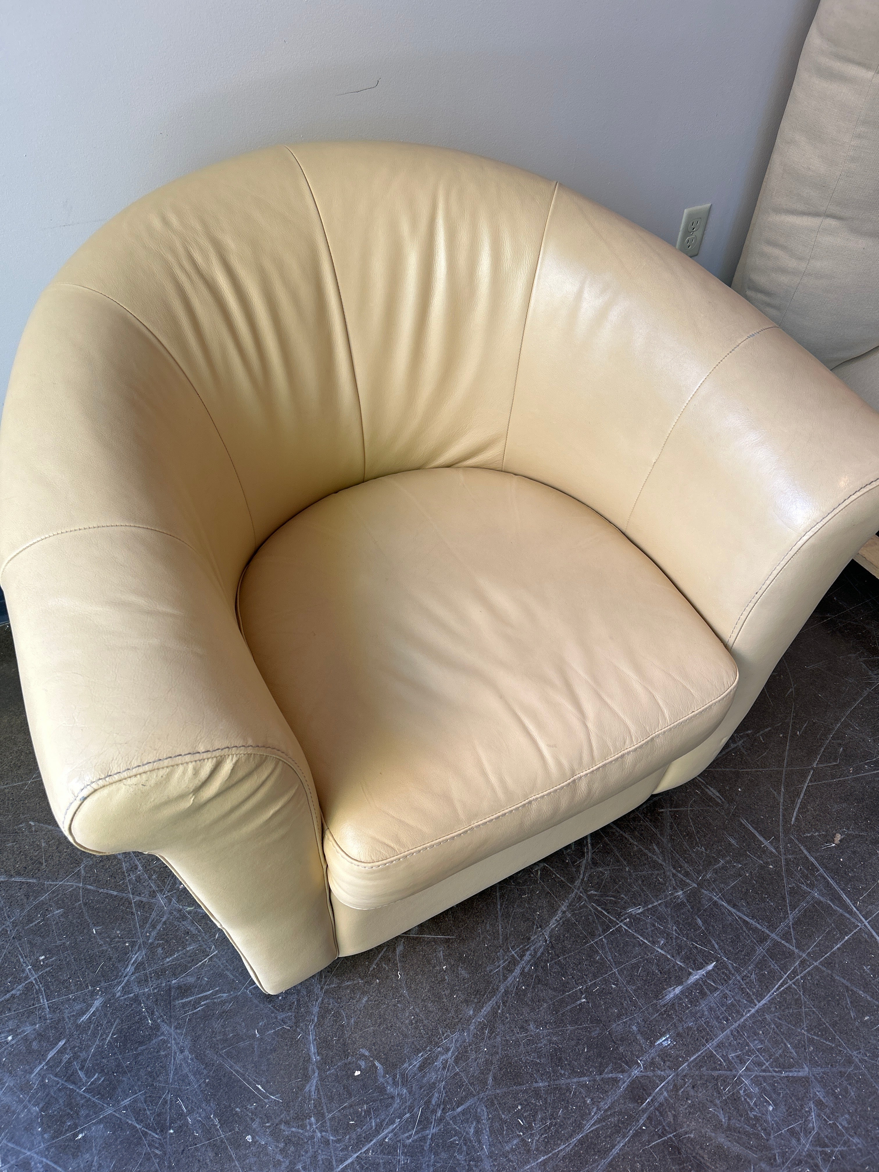 Butter Yellow Colored Leather Swivel Chair