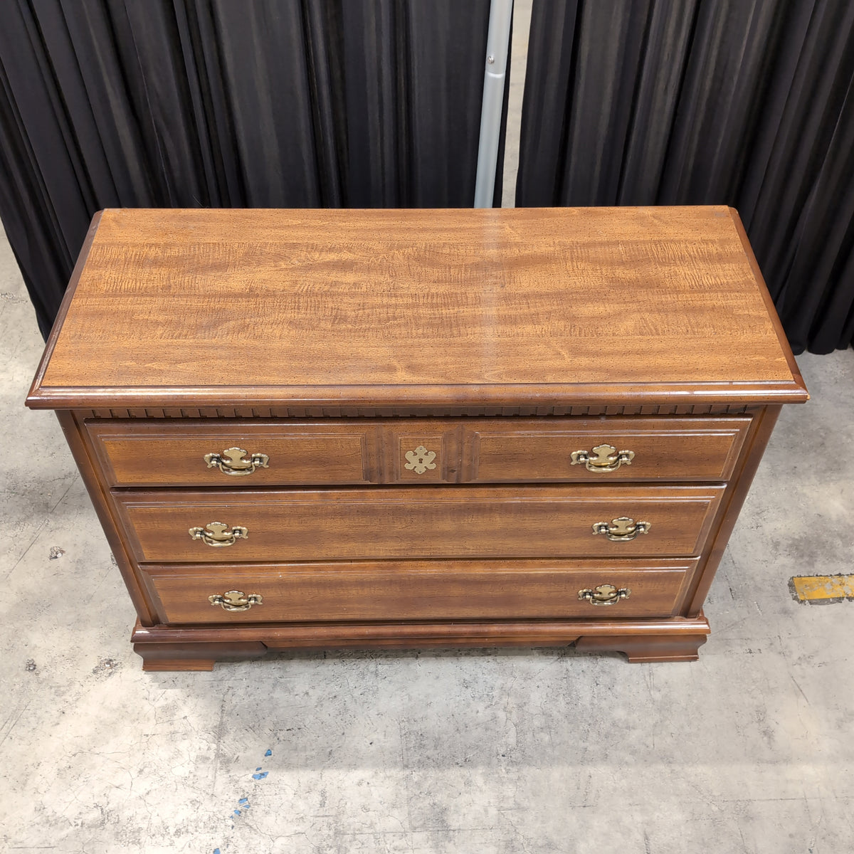 Traditional Brown Wood Dresser with Ornate Hardware