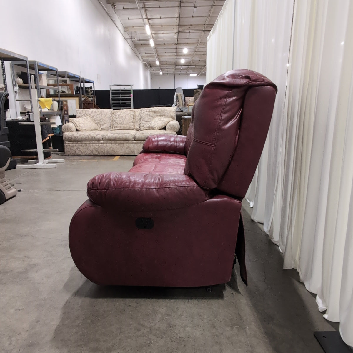 Deep Red Leather Recliner with Padded Headrest