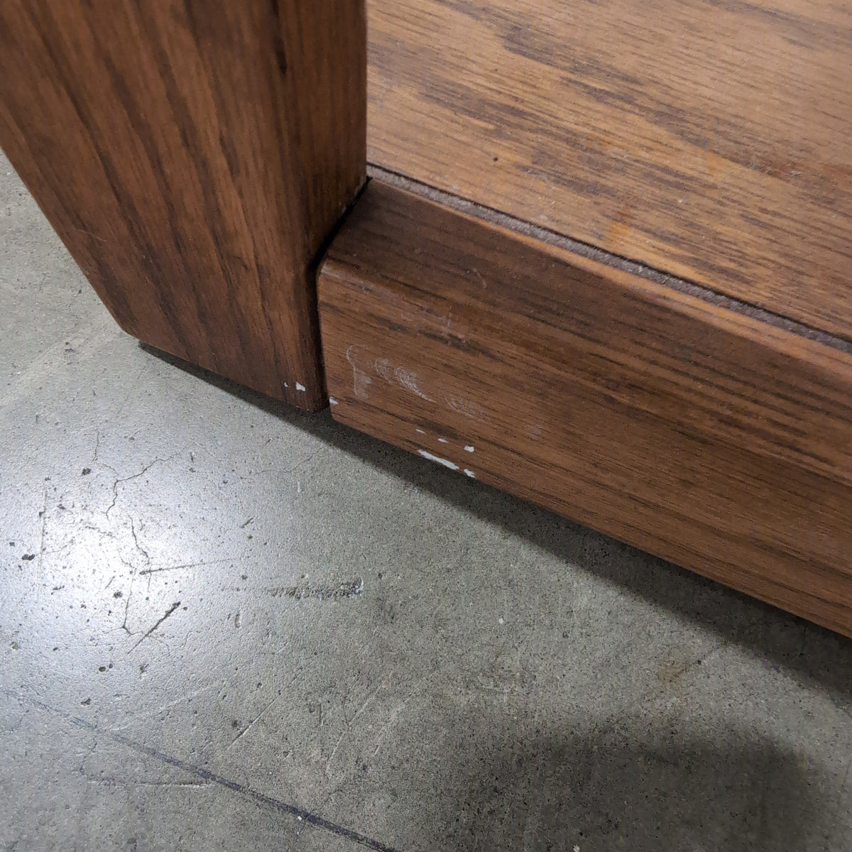 Medium Brown Wood Bookcase with Geometric Cabinet Door