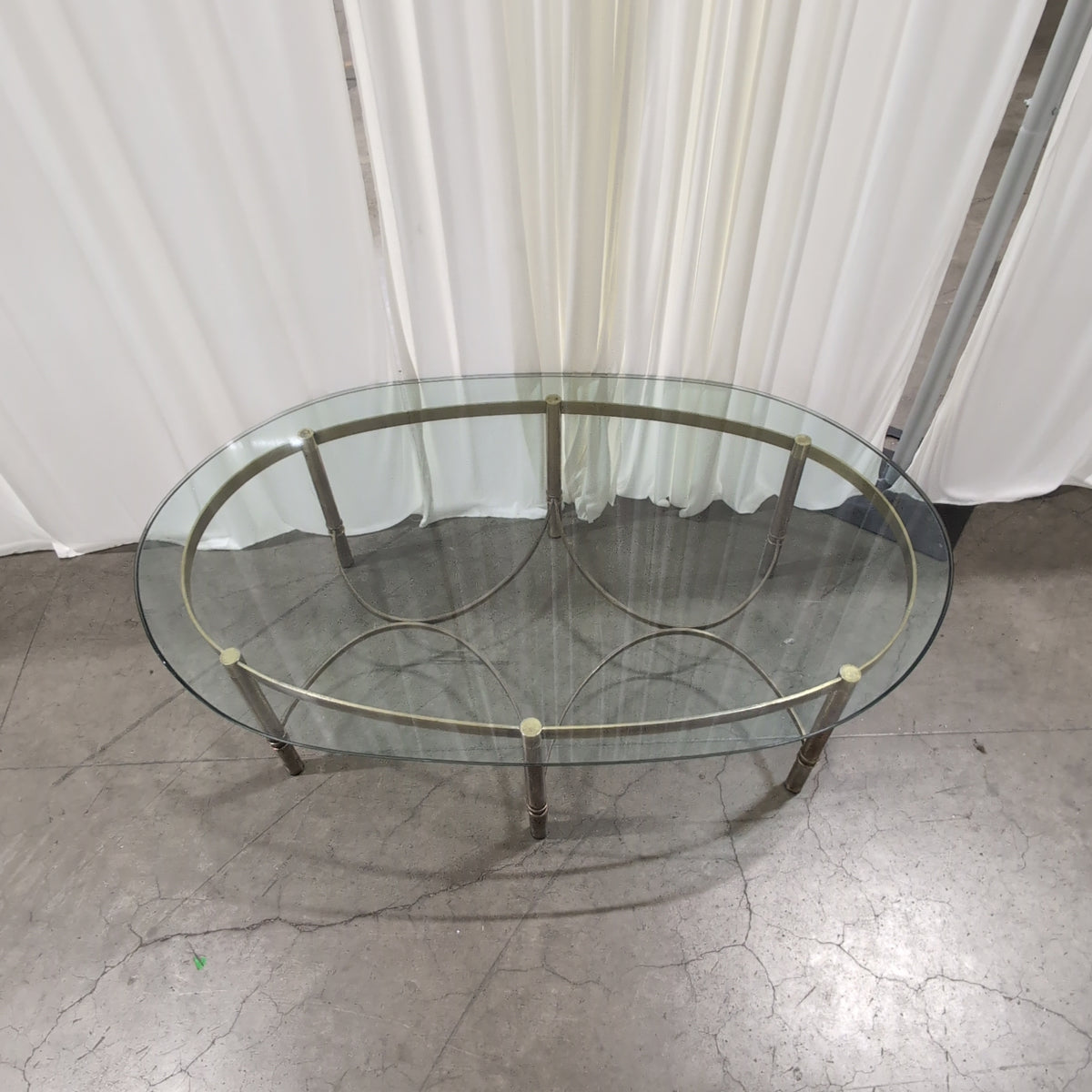 Oval Glass Top Coffee Table in Brass-Tone Metal