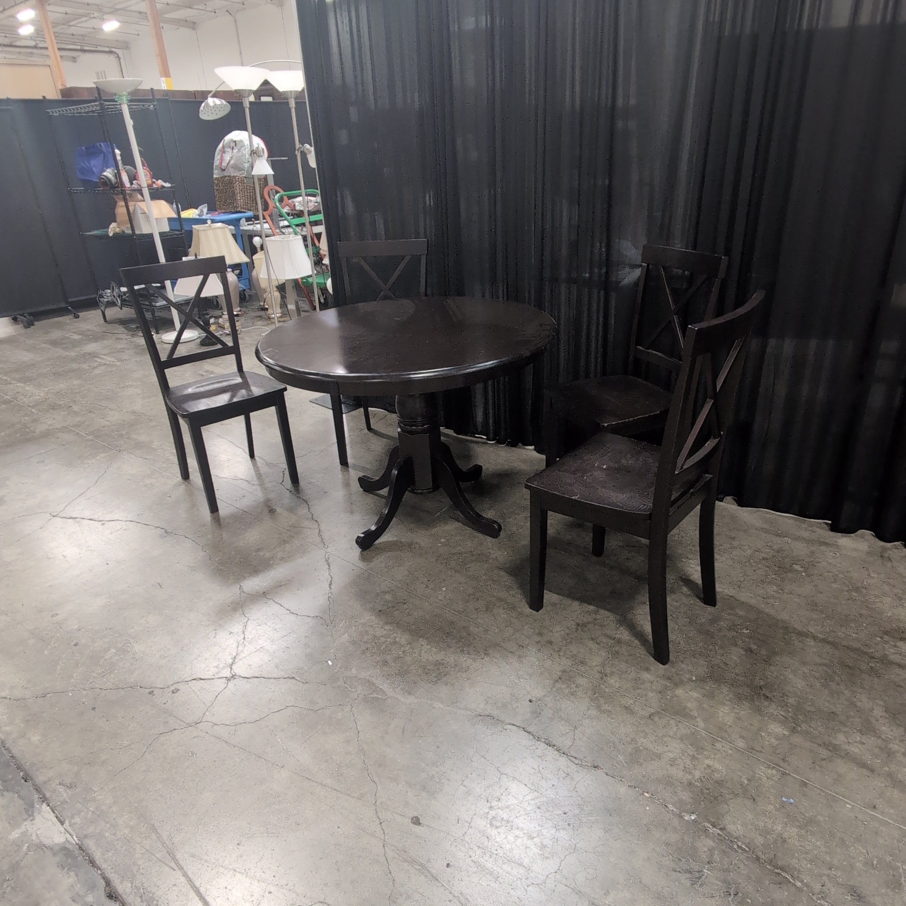 Dark Brown Wood Round Dining Table with X-Back Chairs