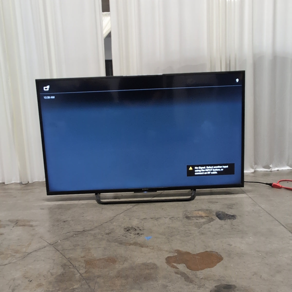 Sony-Black Sony Flat Screen TV with Stand