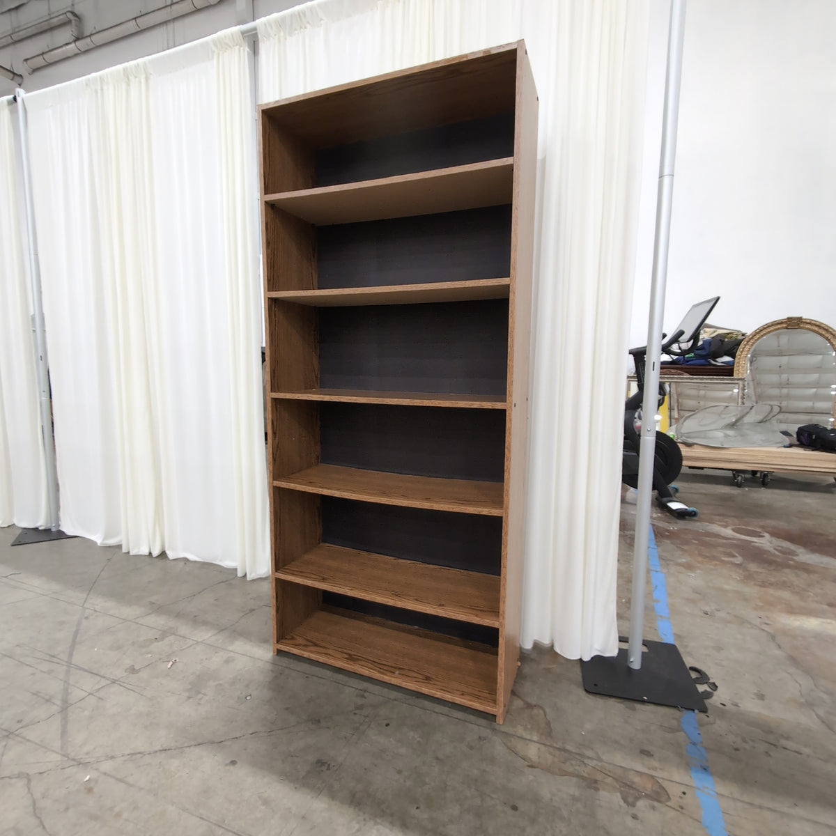 Brown Wood-Look Six-Shelf Bookcase with Dark Back Panels