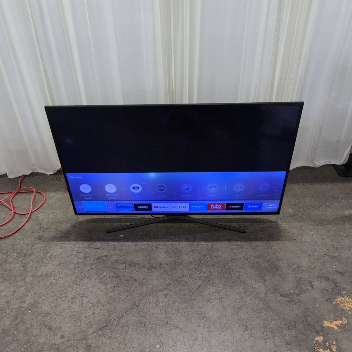 SAMSUNG Black Flat Screen TV with Stand