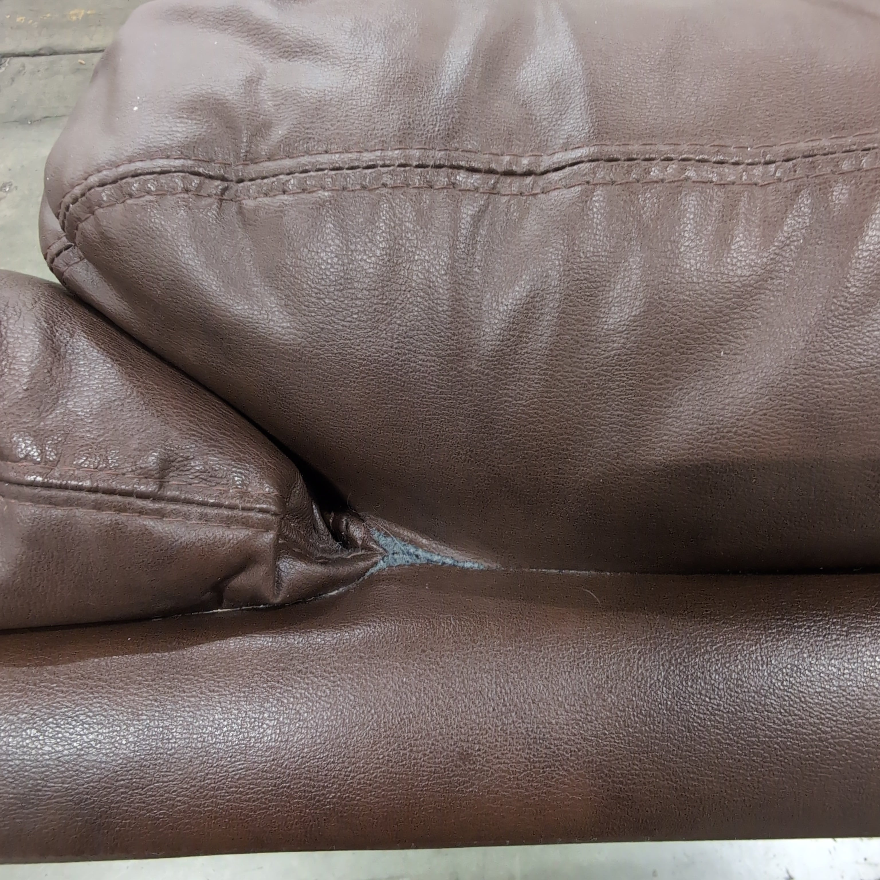 Brown Leather Three-Seat Recliner Couch