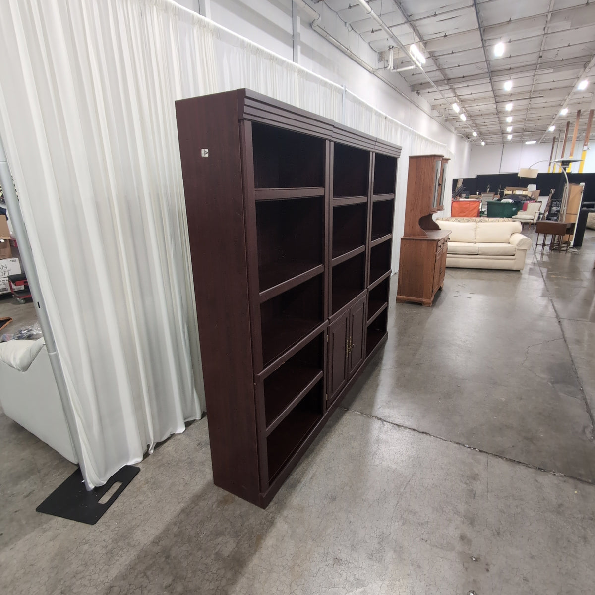 Sauder Dark Brown Three-Section Bookcase with Cabinet Doors
