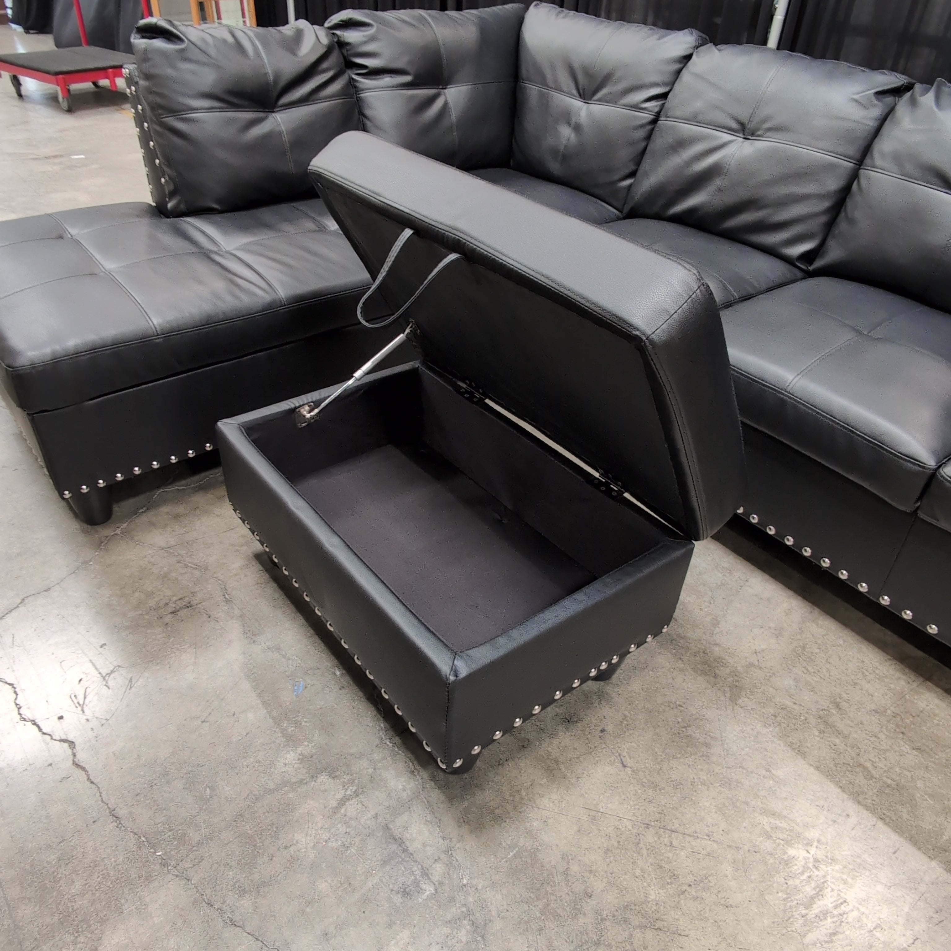 Black Faux Leather Sectional Couch with Ottoman