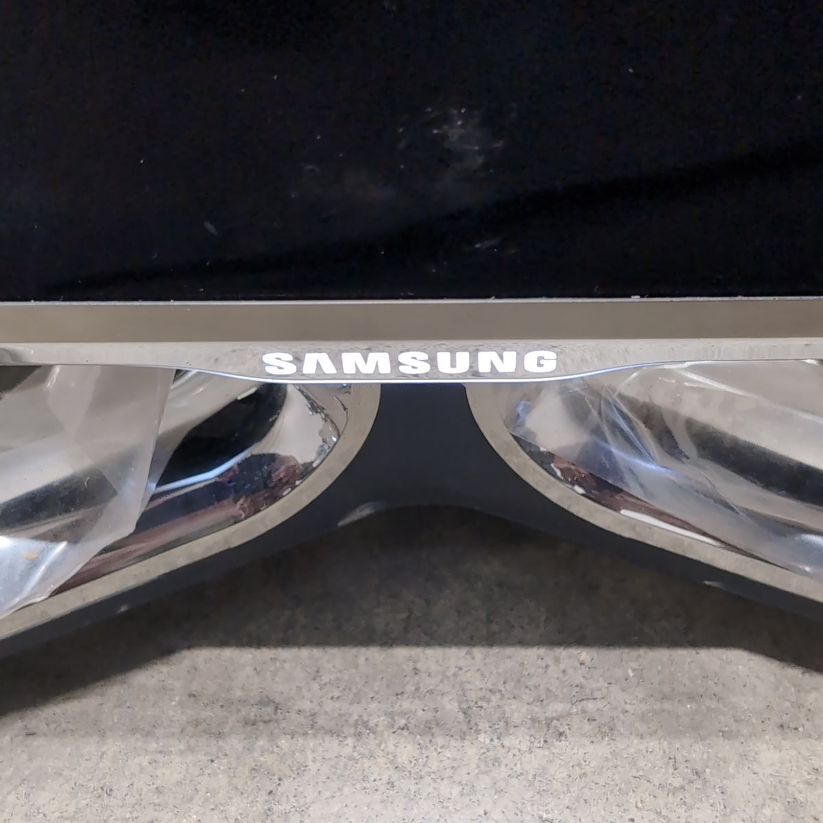 Samsung Modern Black Flat-Screen TV with Silver Stand