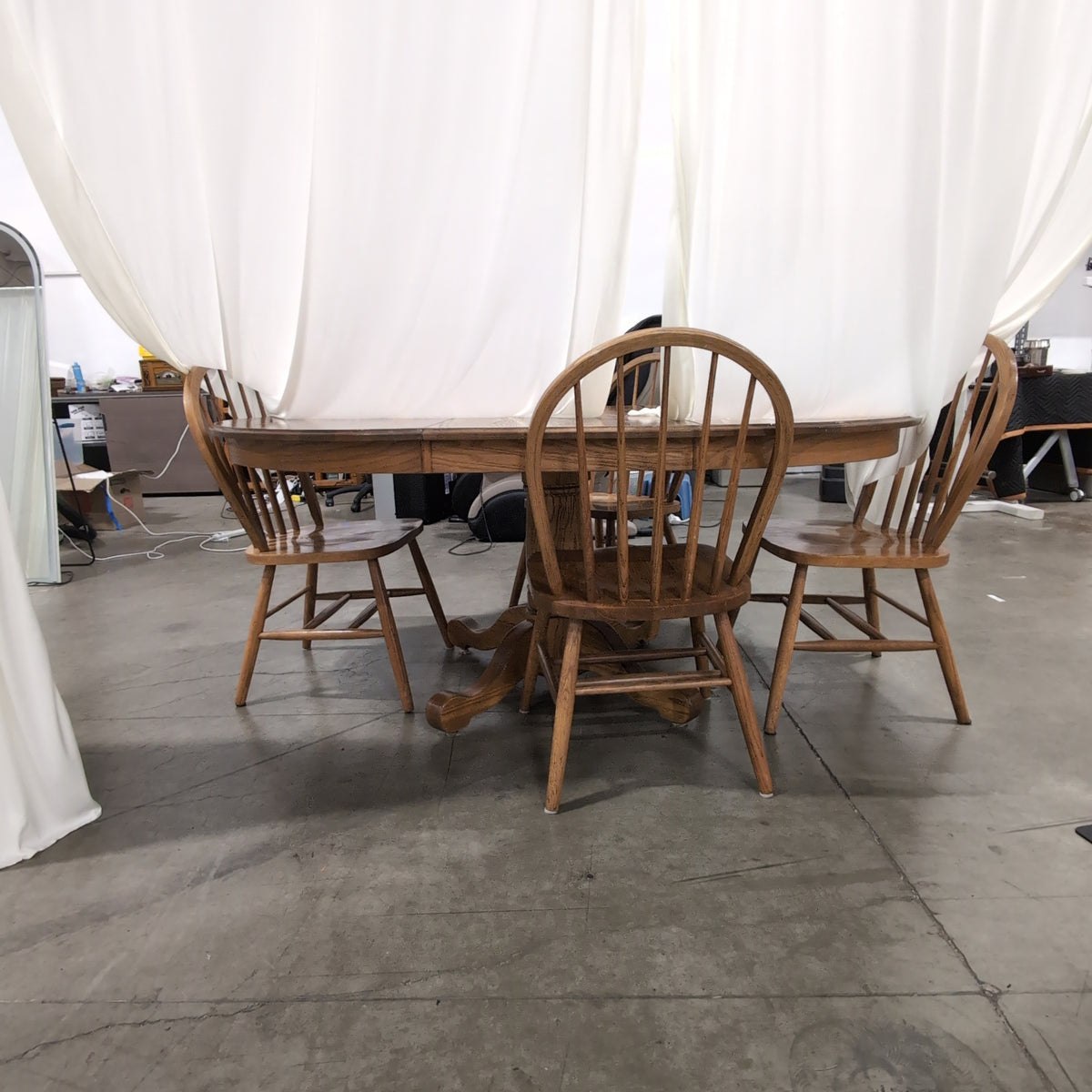 Oval Pedestal Wood Dining Table with Windsor Chairs