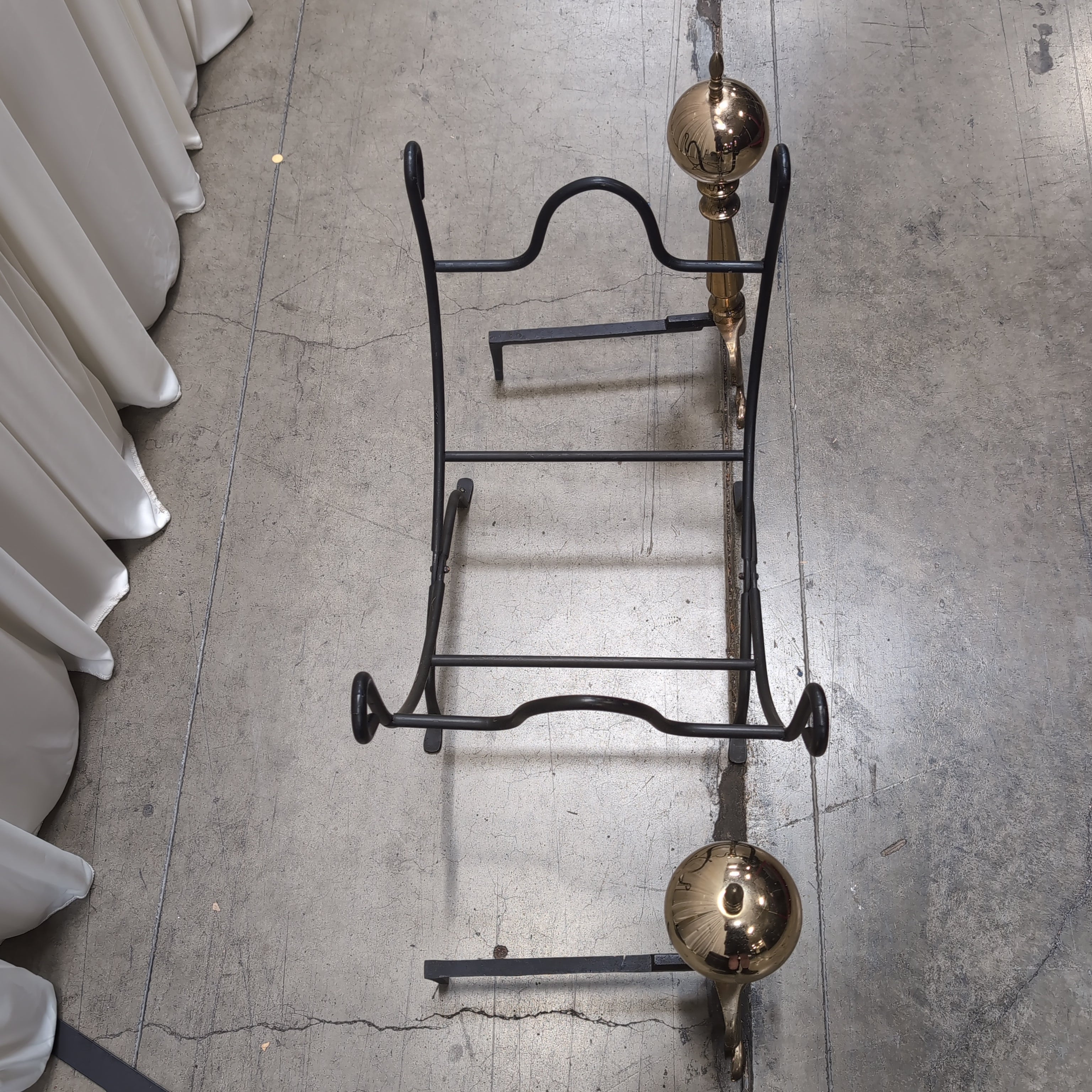 Black Metal firewood Rack with Brass accents