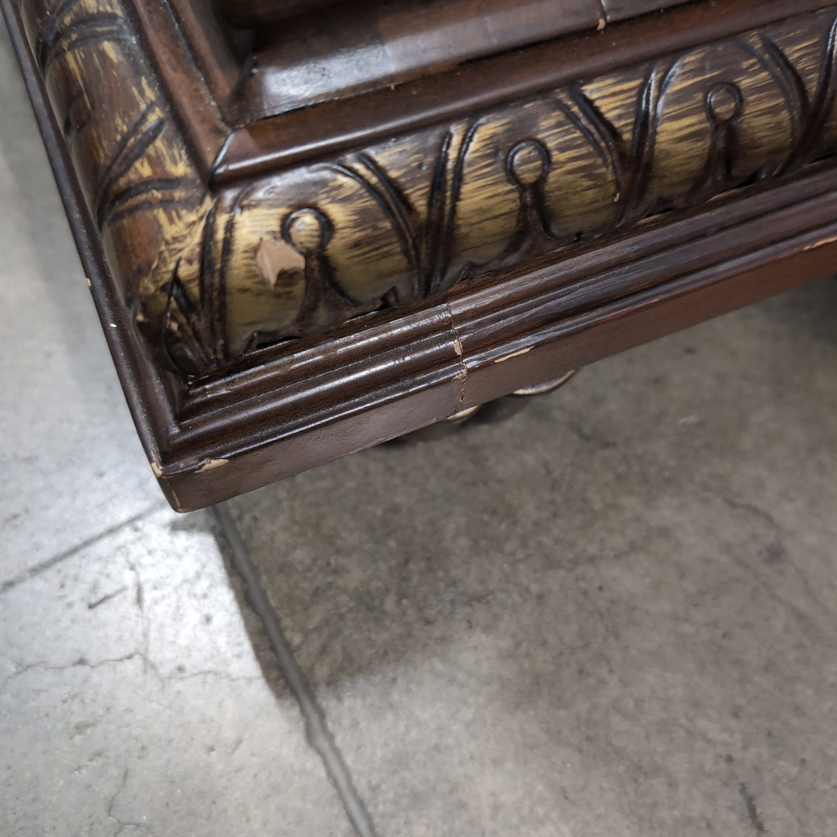 Ornate Dark Wood Three-Drawer Nightstand with Marble Top