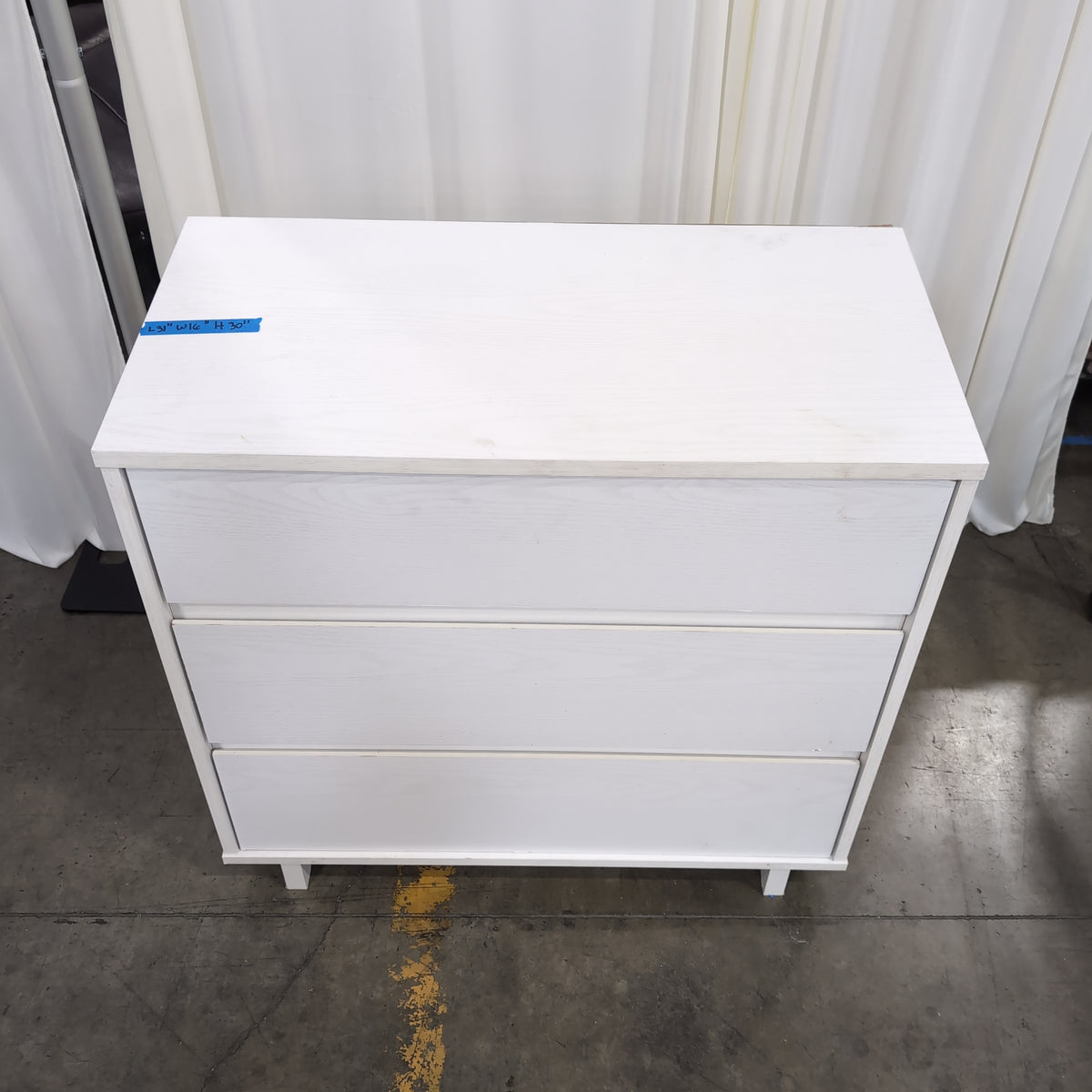 White Three-Drawer Dresser in Wood Finish