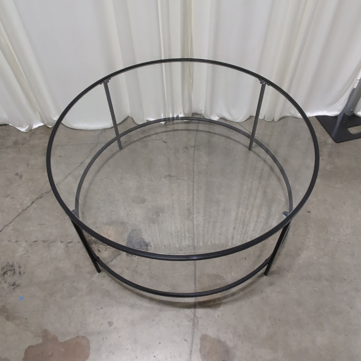 Round Glass Coffee Table with Black Metal Frame
