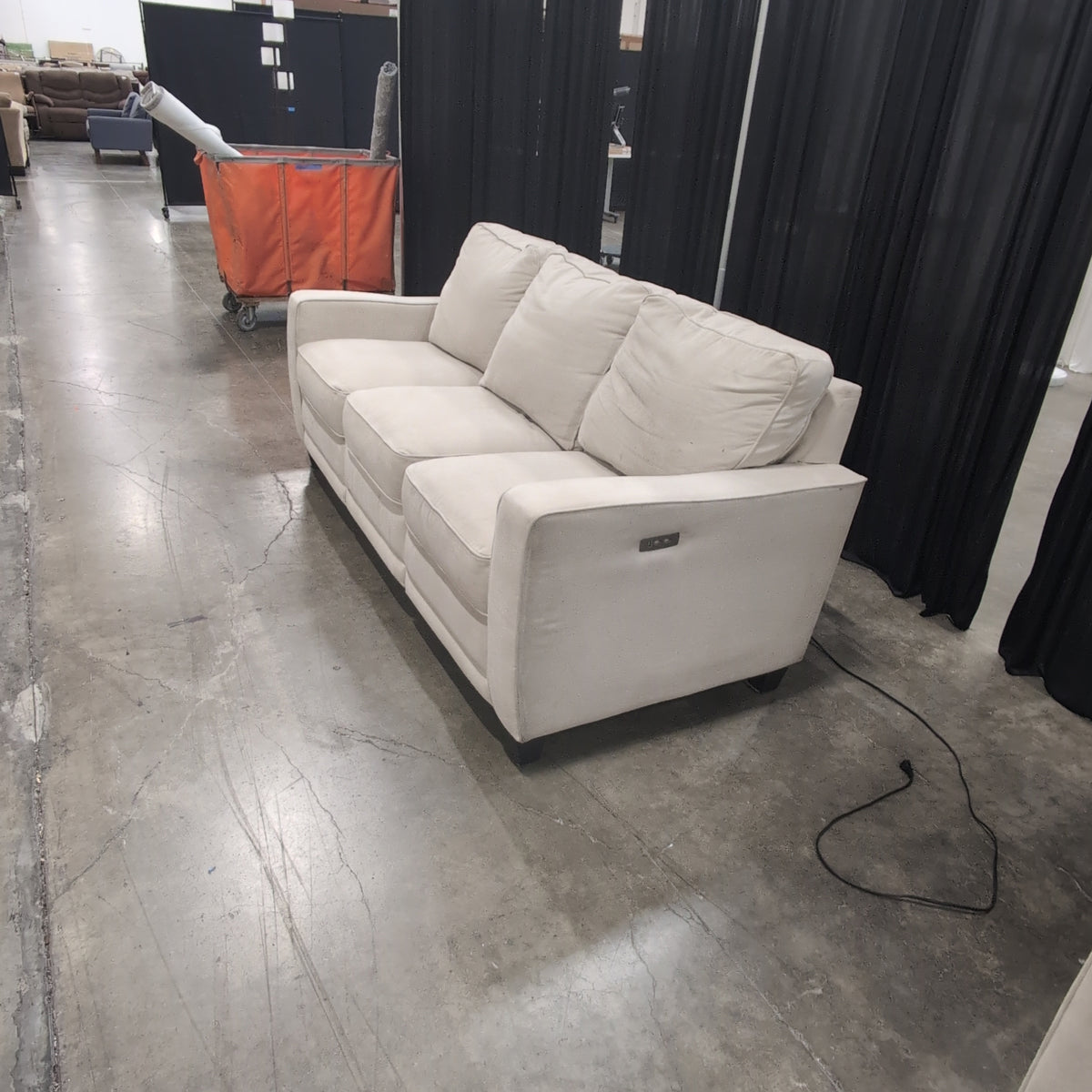 Tan Fabric Three-Seat Reclining Couch with Piped Edges