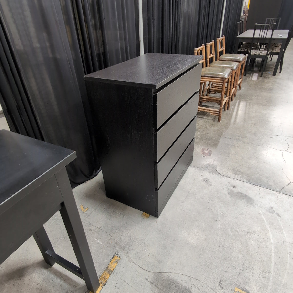 Dark Brown Four-Drawer Dresser in Wood-Look Laminate