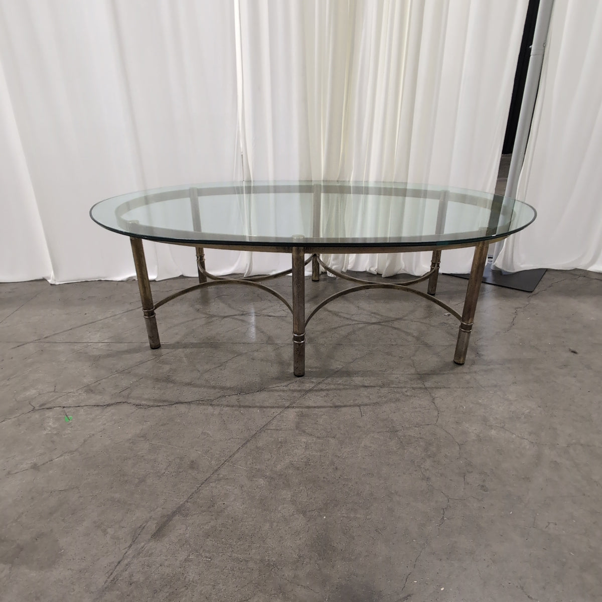 Oval Glass Top Coffee Table in Brass-Tone Metal