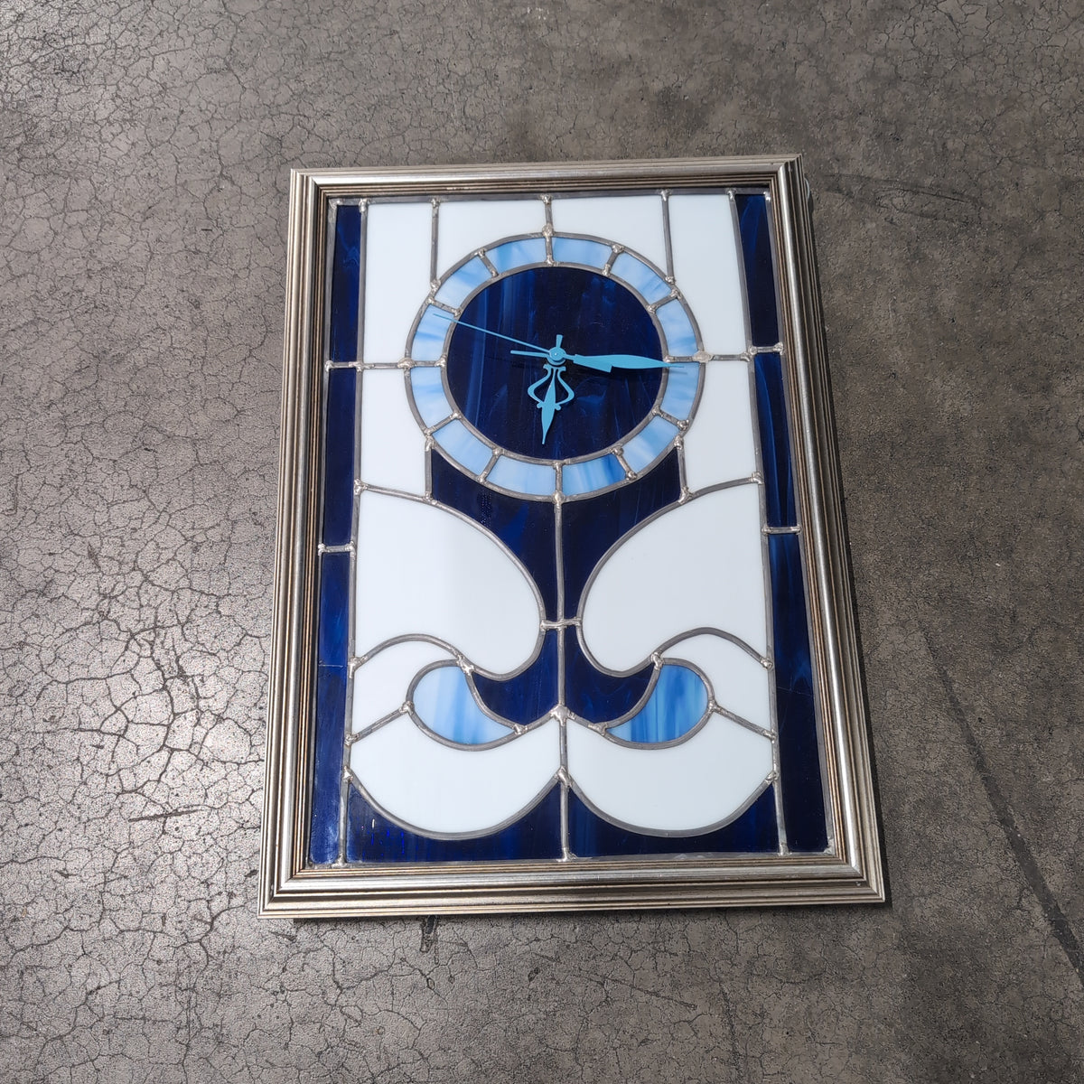 Blue and White Stained Glass Wall Clock