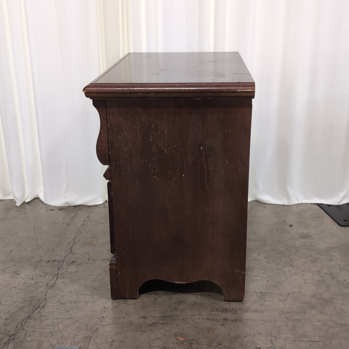 Traditional Dark Wood Two-Drawer Nightstand with Ornate Hardware