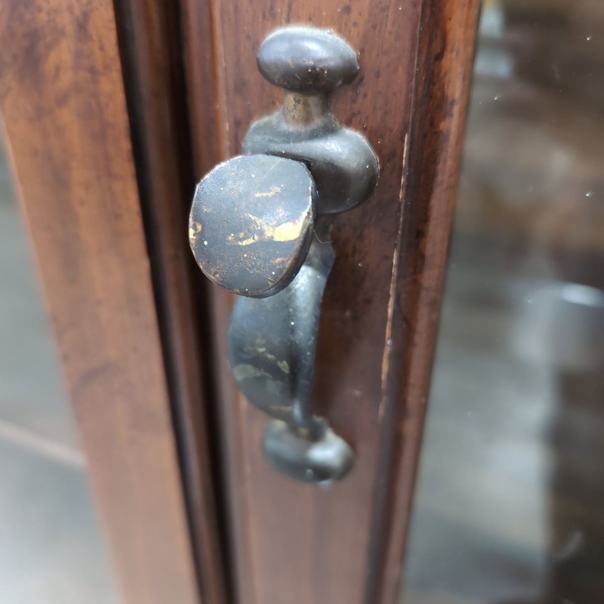 Brown Wood China Cabinet with Ornate Carvings