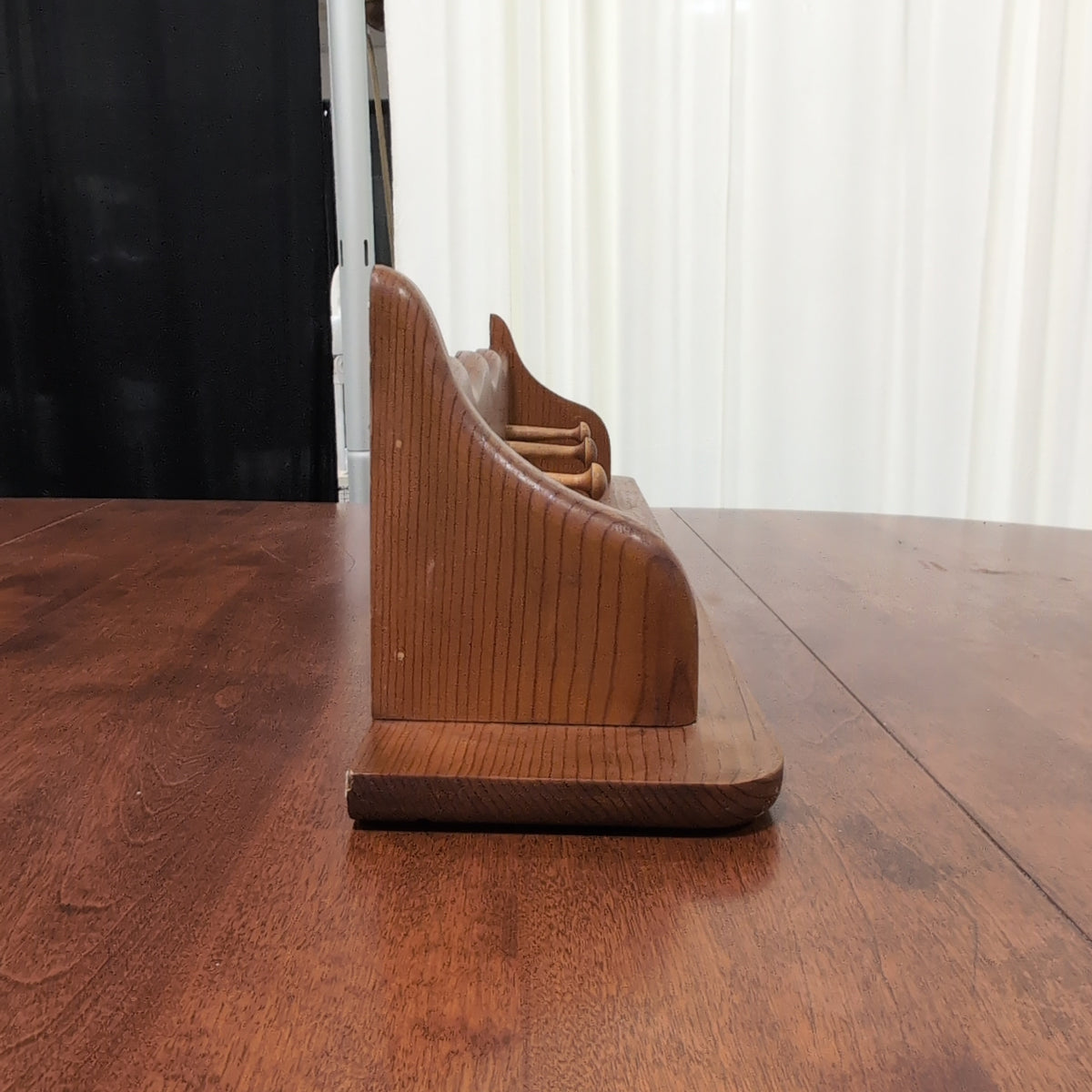 Natural Wood Scalloped Wall Shelf with Four Pegs