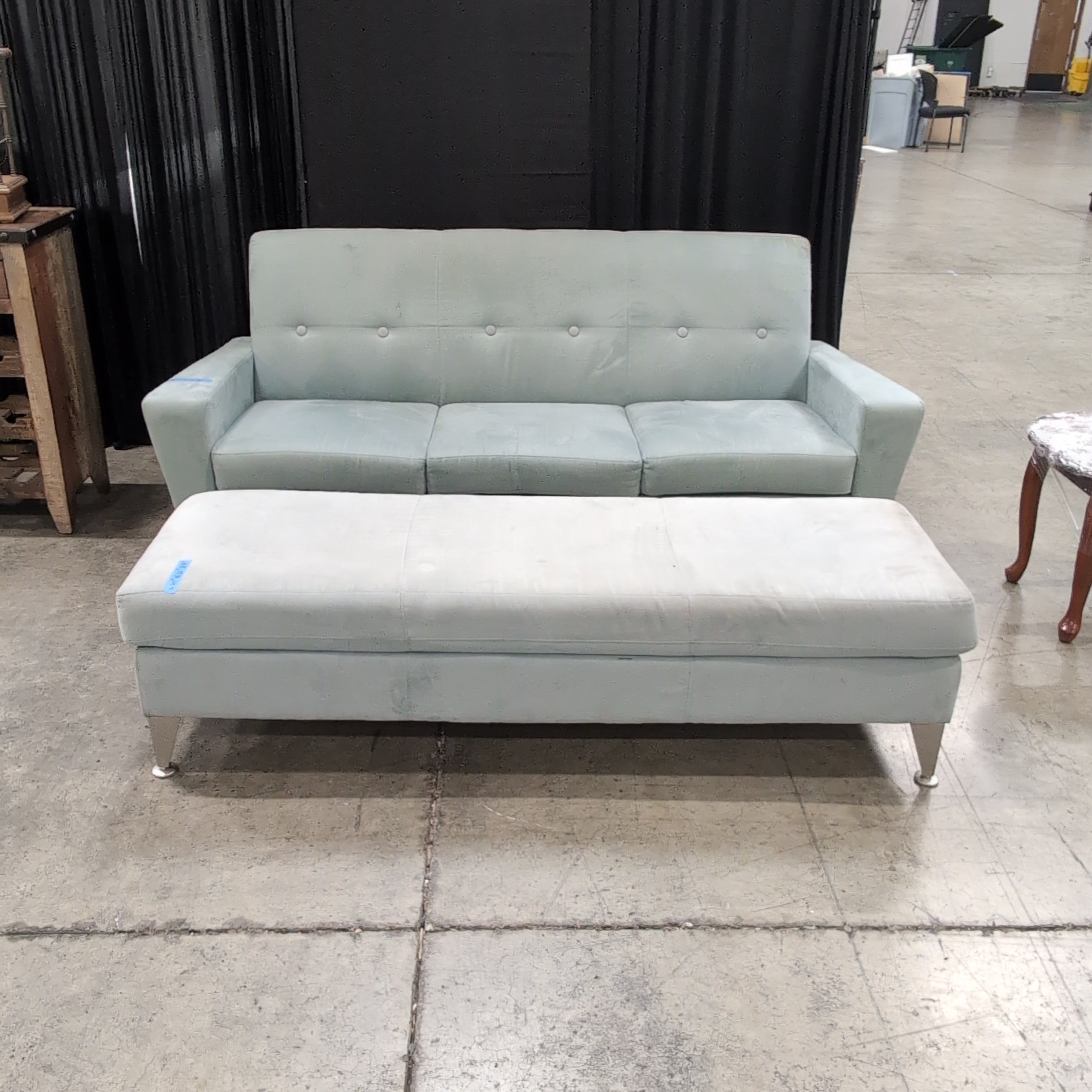 Light Grey Upholstered Couch with Tufted Back