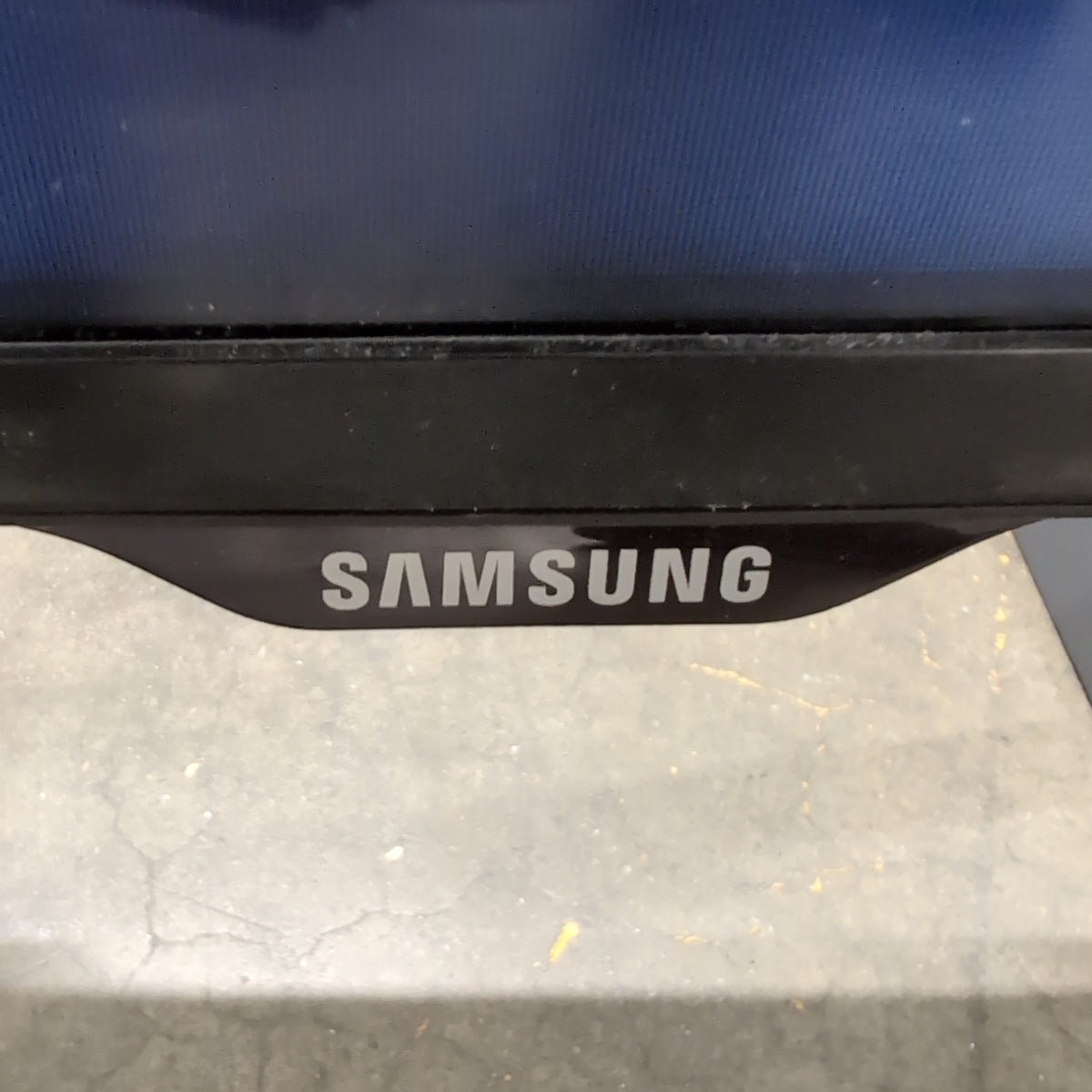 SAMSUNG Black Flat Screen Television with Stand