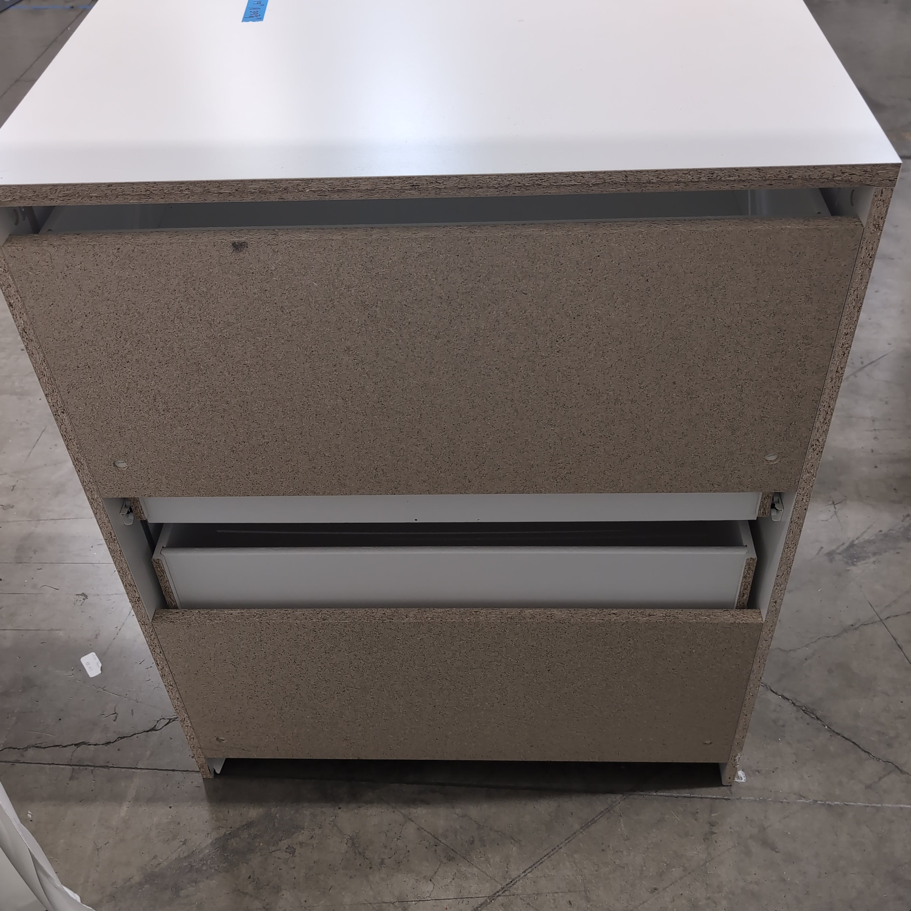 White Laminate Four-Drawer Dresser
