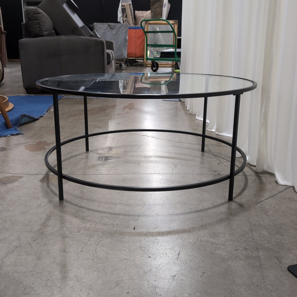 Round Glass Coffee Table with Black Metal Frame