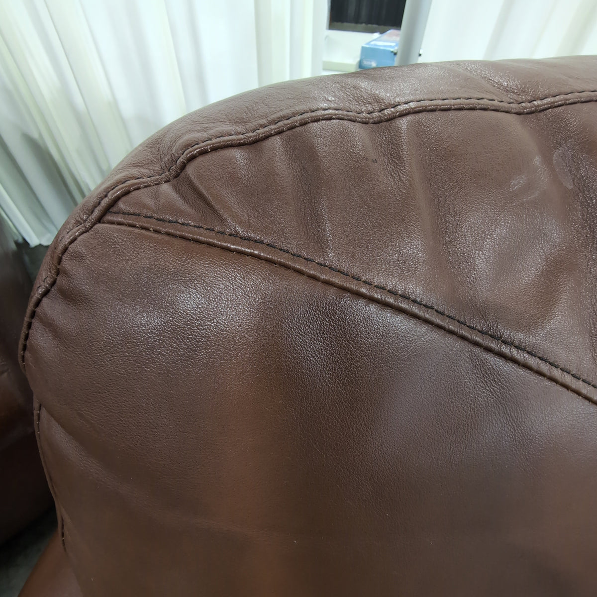 Brown Leather Curved Sectional Couch