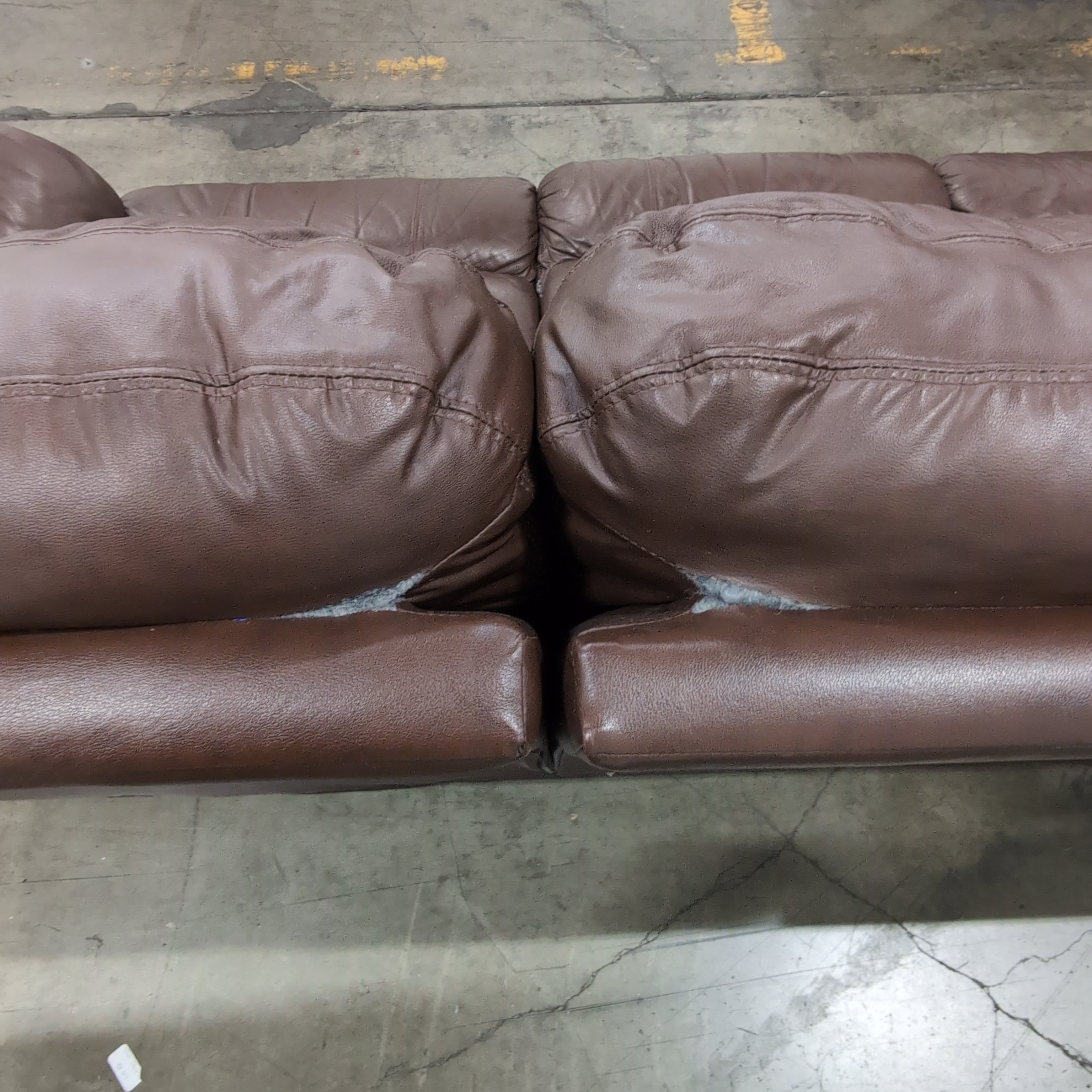 Brown Leather Three-Seat Recliner Couch