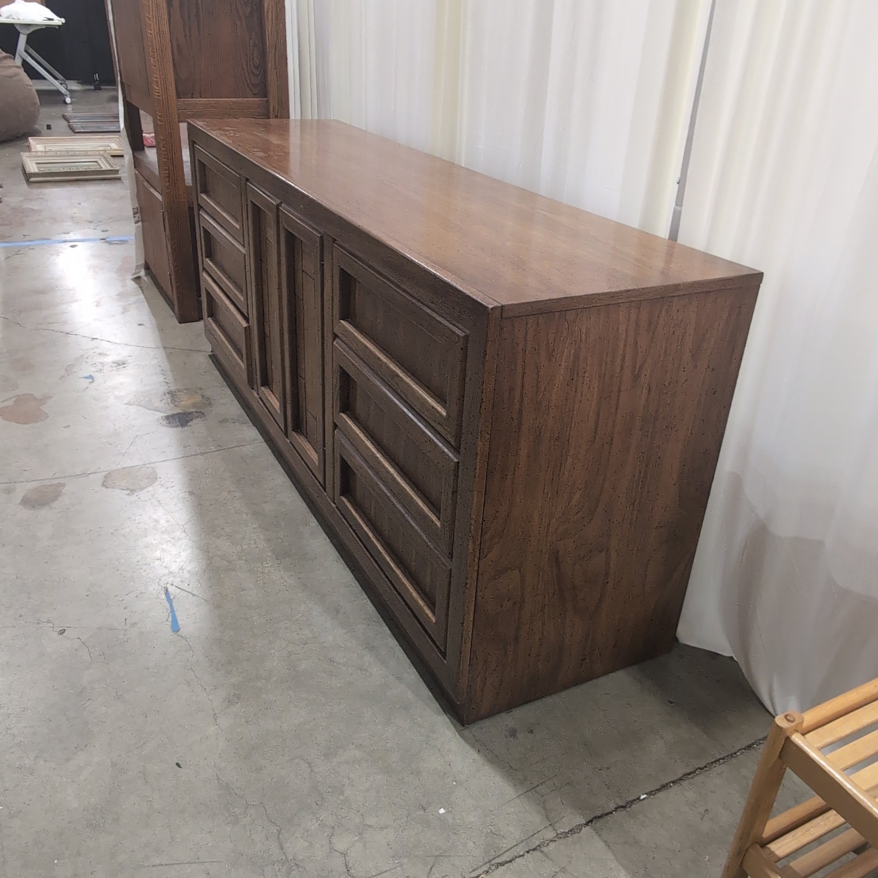 Long Brown Wood Dresser with Geometric Paneling